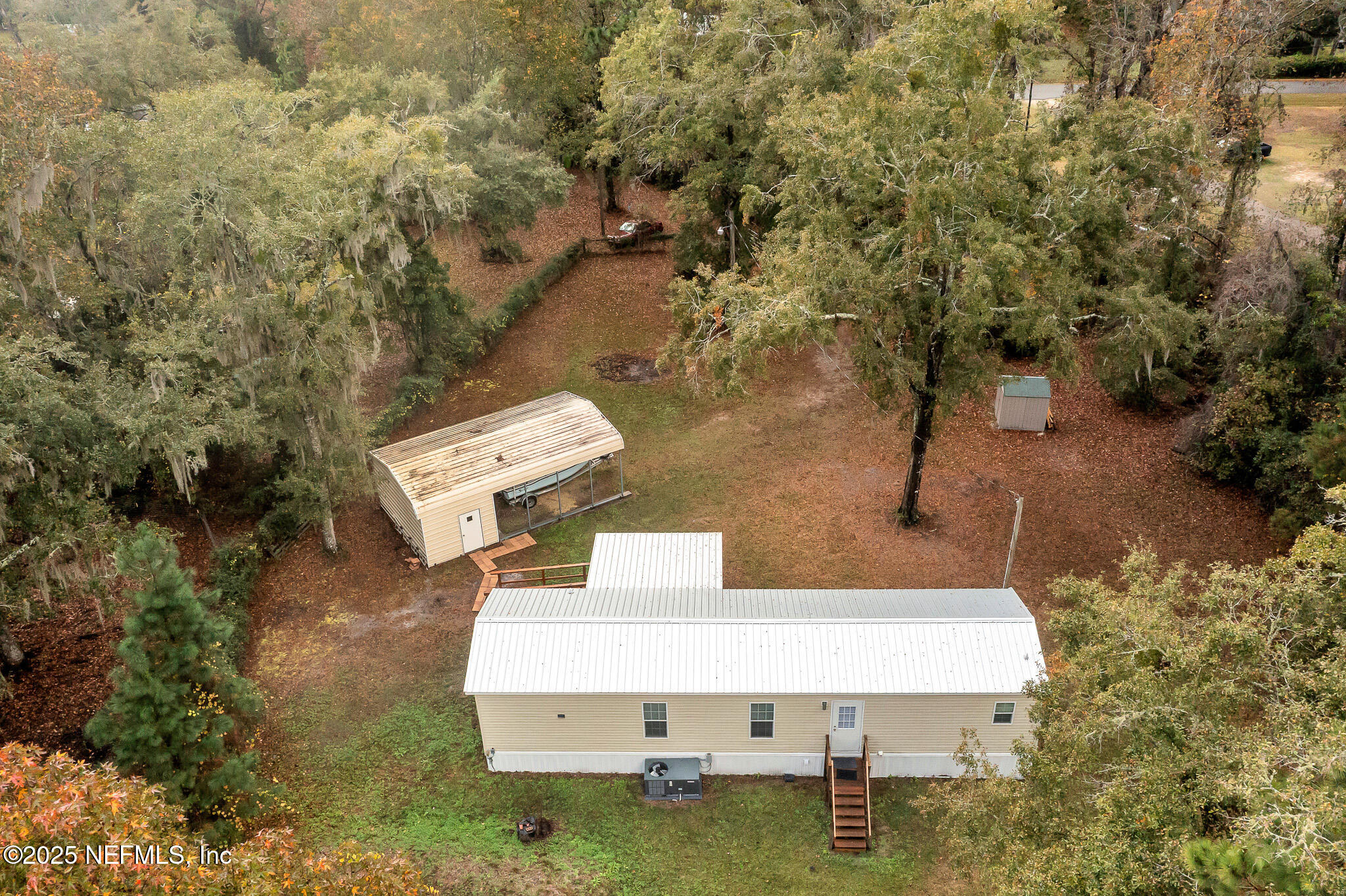 86446 Peeples Road Yulee, FL 32097 - Photo 13 of 42 a picture of a table and chairs in the patio