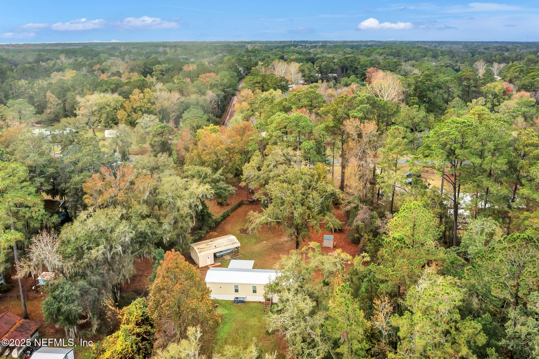 86446 Peeples Road Yulee, FL 32097 - Photo 16 of 42 a view of a room with a yard and mountain view