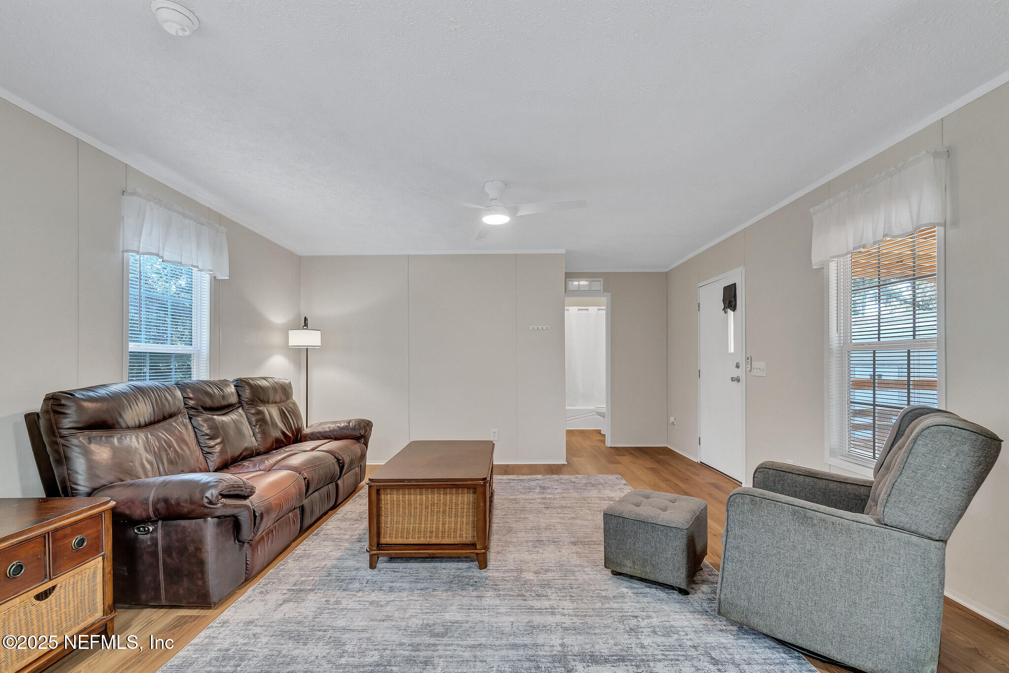 86446 Peeples Road Yulee, FL 32097 - Photo 25 of 42 a living room with furniture and a couch