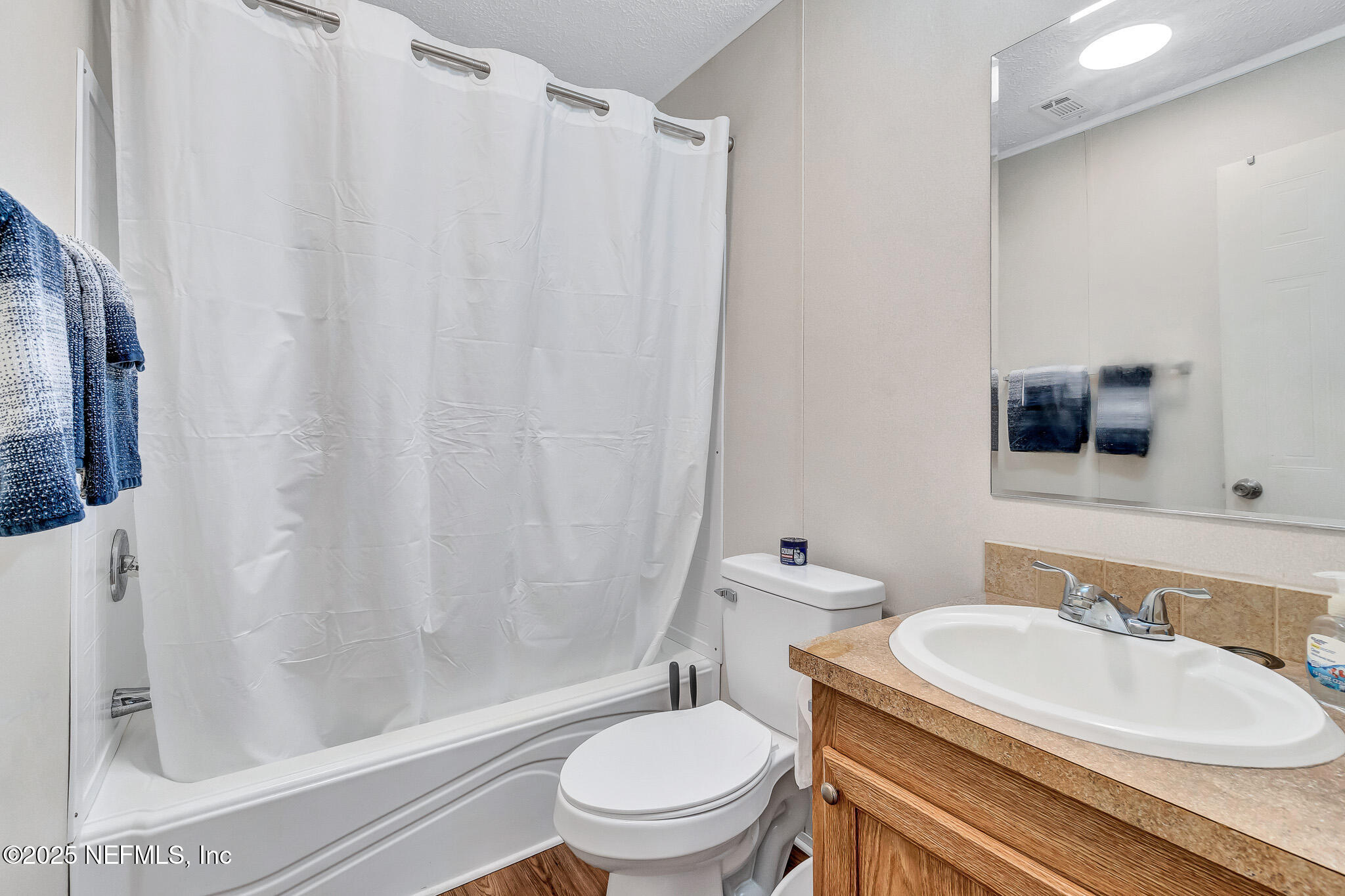 86446 Peeples Road Yulee, FL 32097 - Photo 42 of 42 a bathroom with a sink toilet and shower