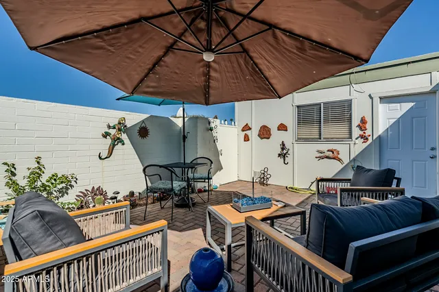 a view of balcony with furniture
