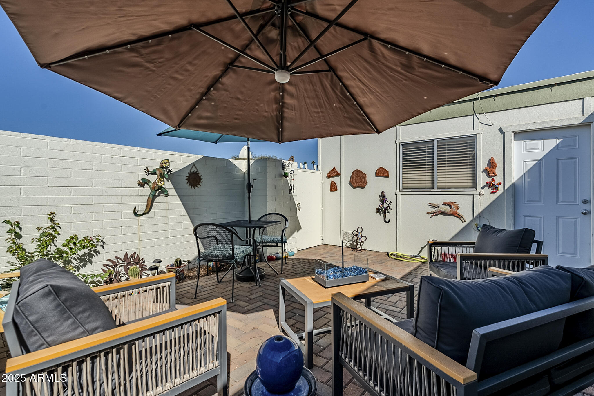 10010 West Royal Oak Road, Unit R Sun City, AZ 85351 - Photo 24 of 28 a view of balcony with furniture