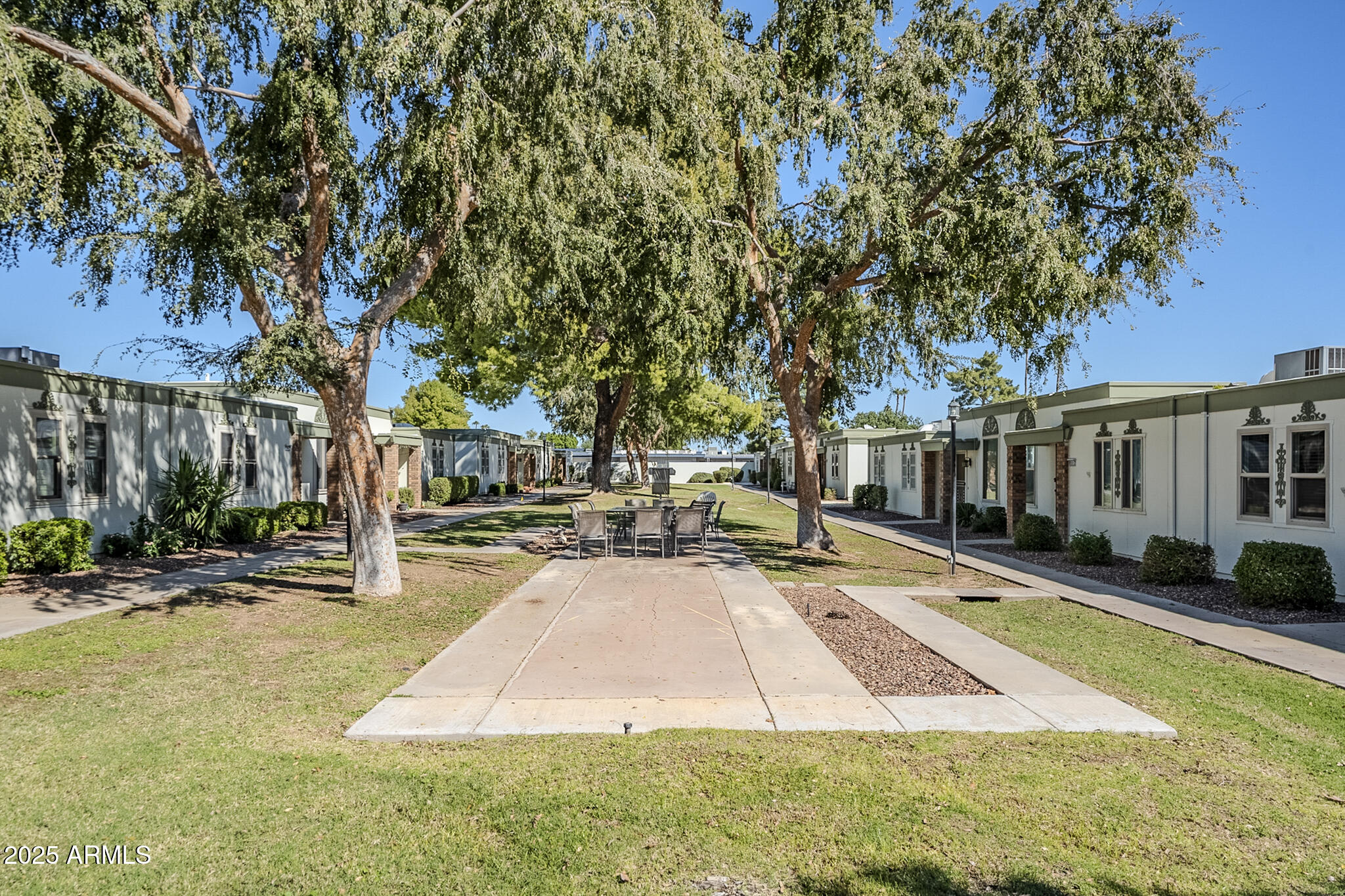 10010 West Royal Oak Road, Unit R Sun City, AZ 85351 - Photo 26 of 28 a view of a house with entertaining space
