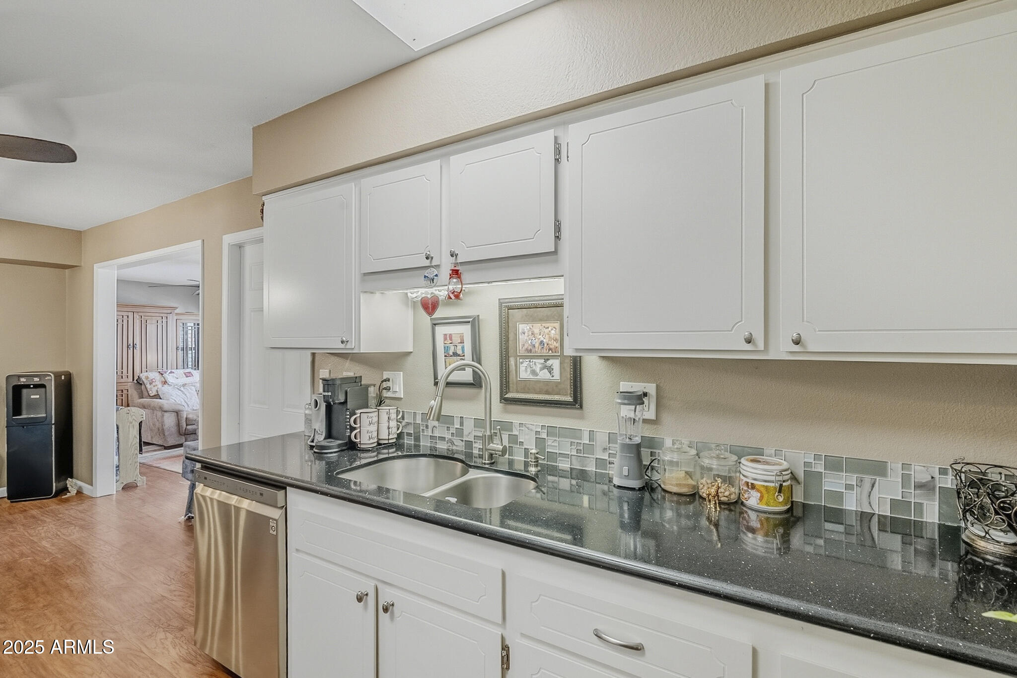 10010 West Royal Oak Road, Unit R Sun City, AZ 85351 - Photo 9 of 28 a kitchen with sink and cabinets