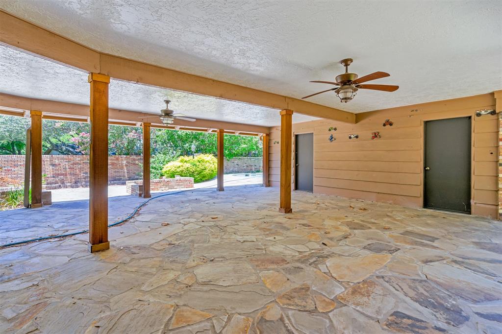 7019 Spring Valley Road Dallas, TX 75254 - Photo 15 of 19 a view of empty room with front door