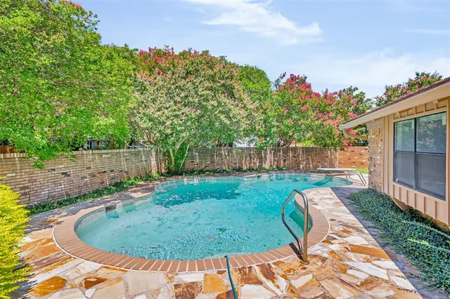 a view of a backyard with a garden