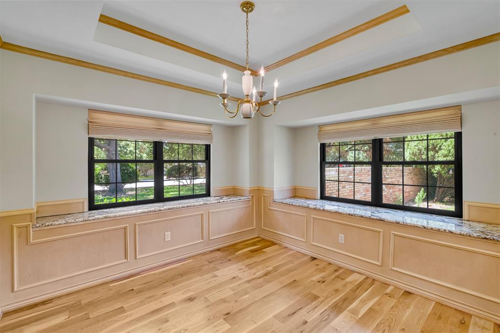 7019 Spring Valley Road Dallas, TX 75254 - Photo 10 of 19 a view of an empty room with a window
