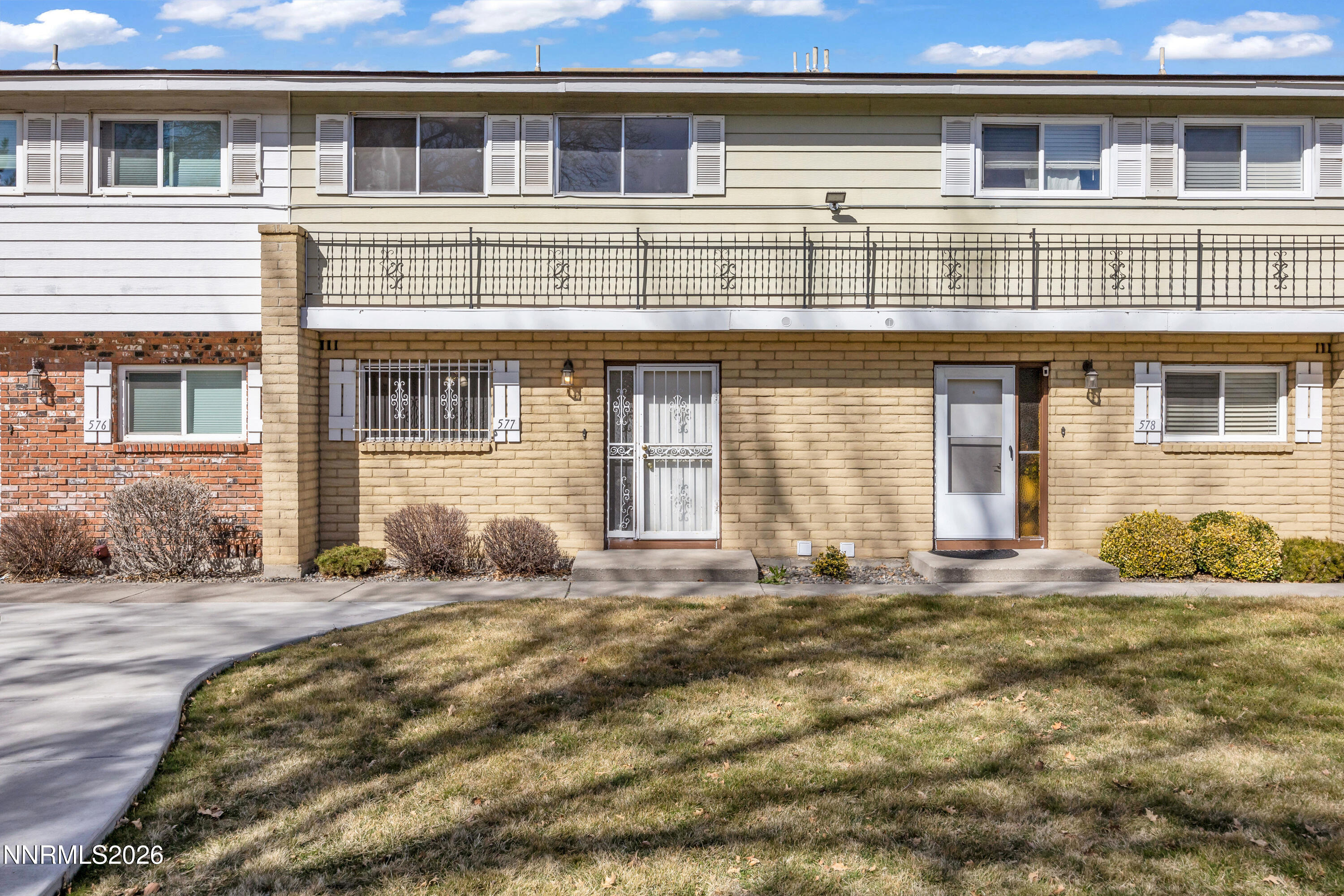 577 Smithridge Park Reno, NV 89502 - Photo 1 of 31 a front view of a house with a yard