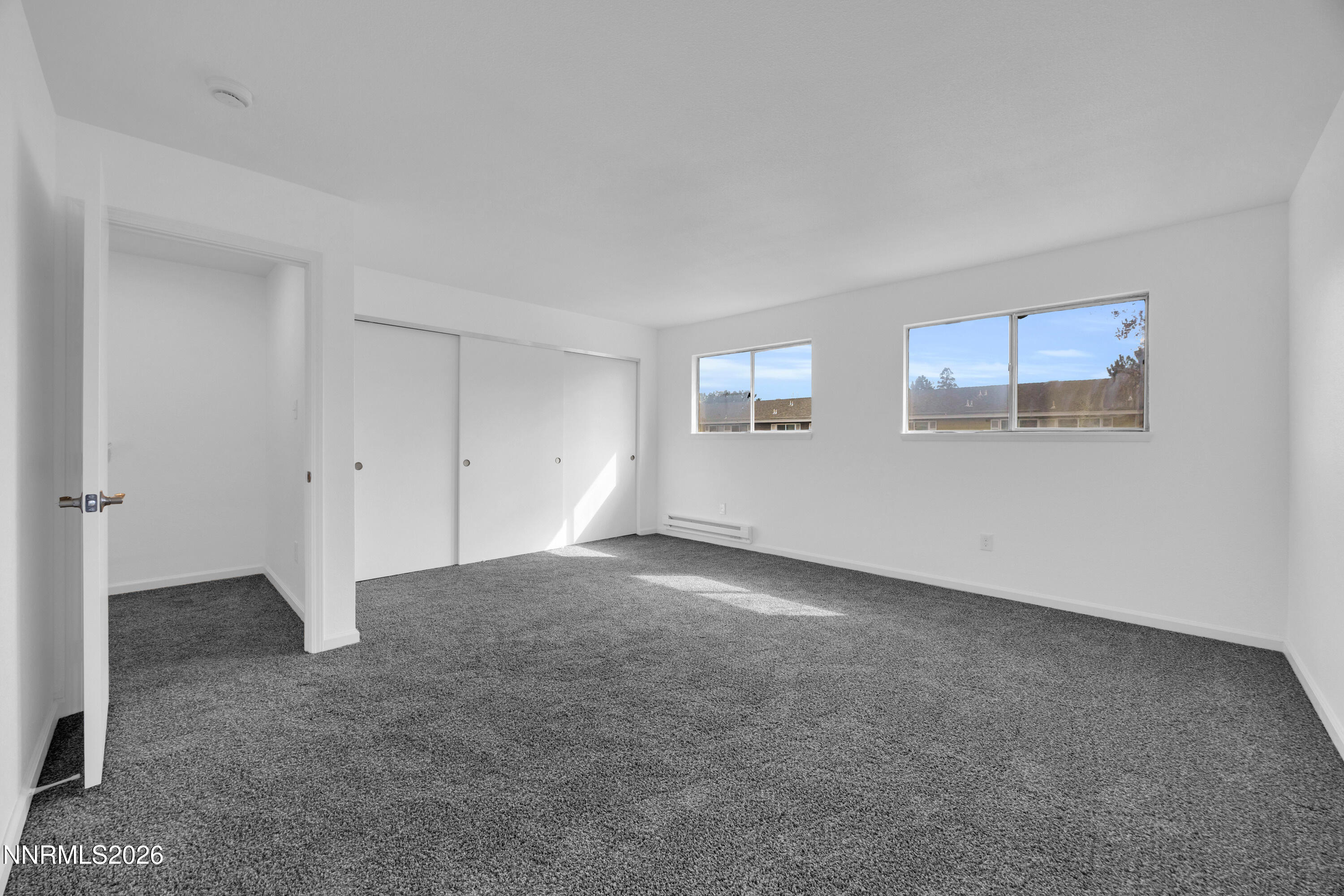 577 Smithridge Park Reno, NV 89502 - Photo 19 of 31 a view of an empty room with a window