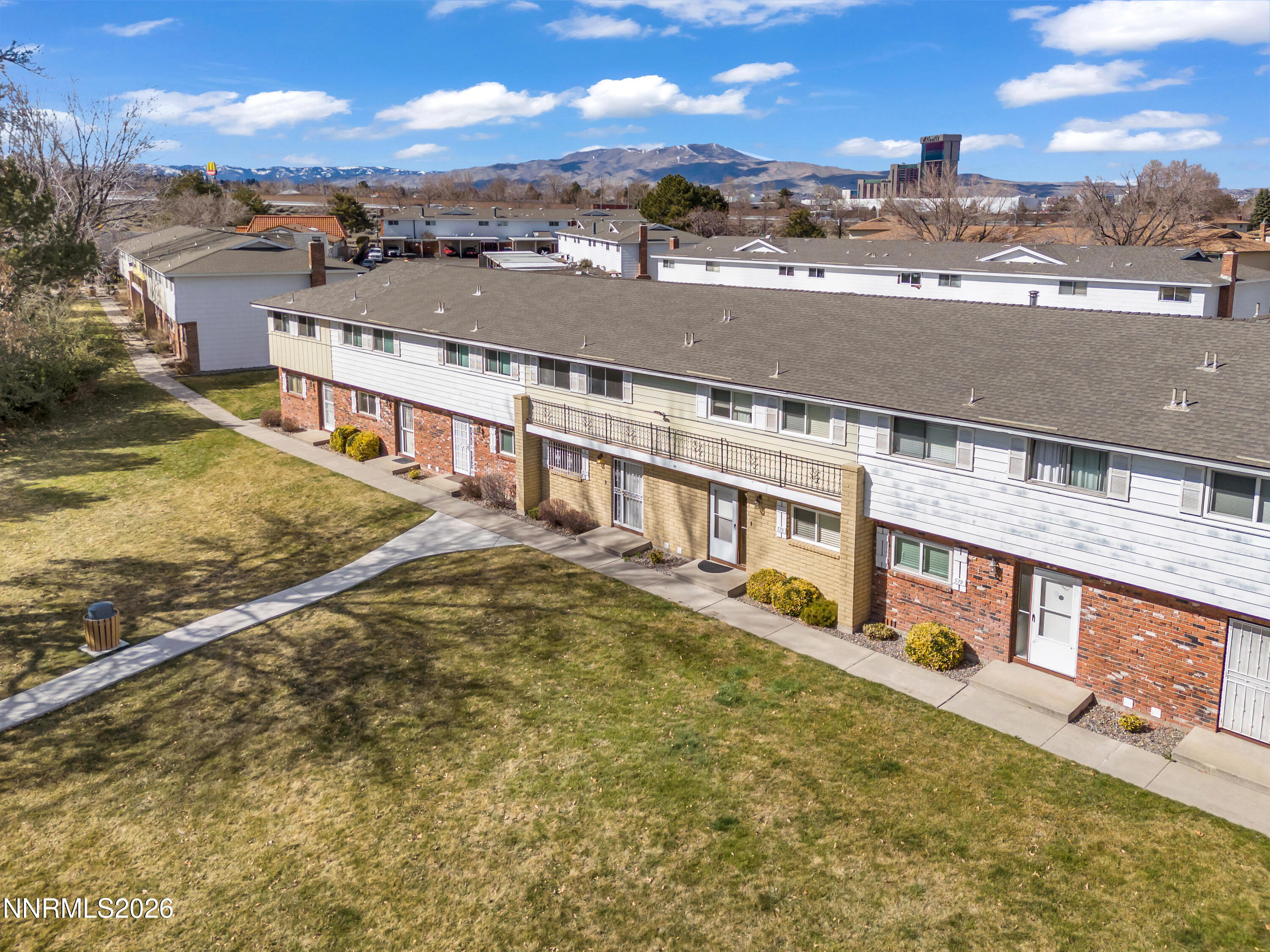 577 Smithridge Park Reno, NV 89502 - Photo 2 of 31 an aerial view of residential houses with outdoor space and river