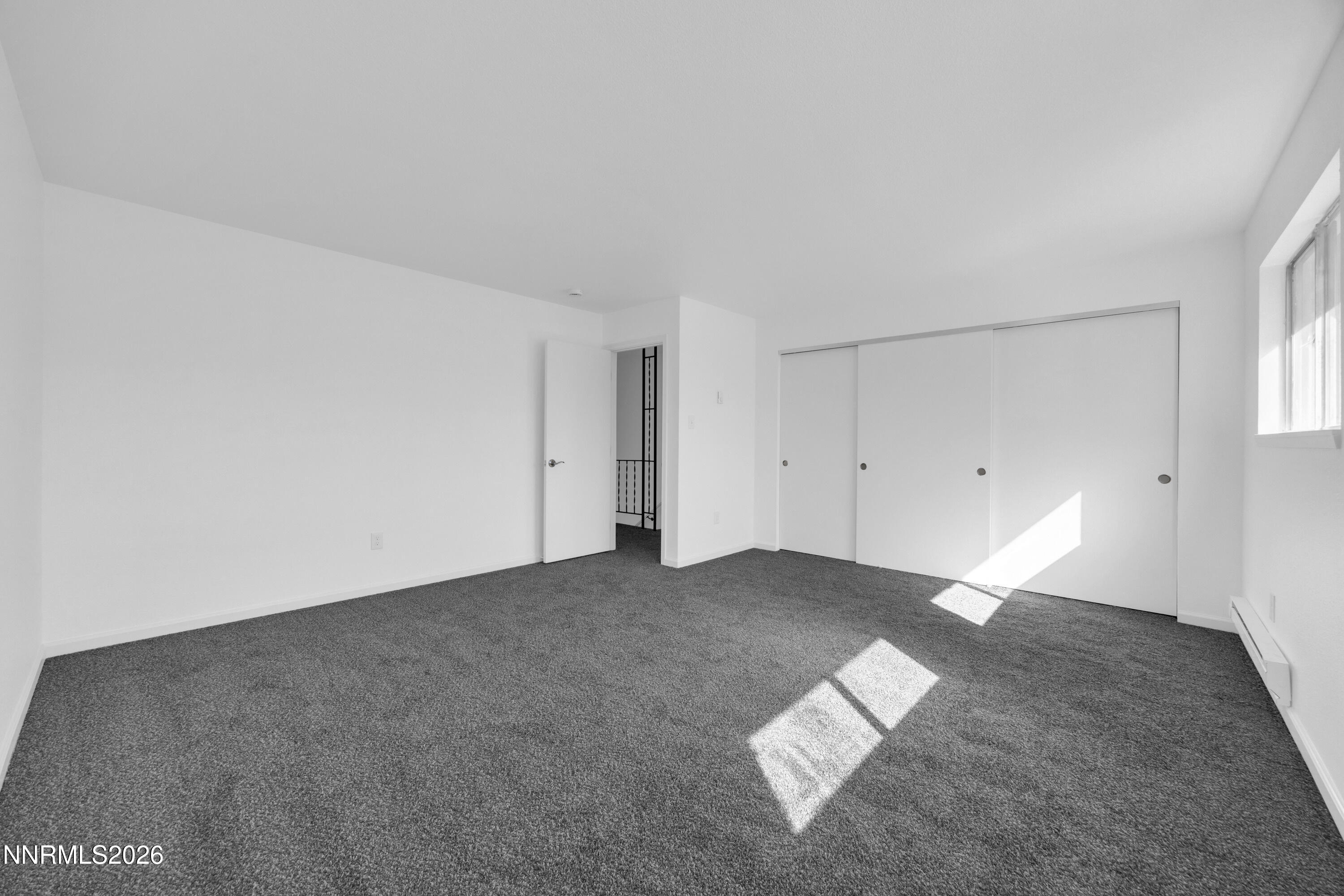 577 Smithridge Park Reno, NV 89502 - Photo 21 of 31 an empty room with an entryway