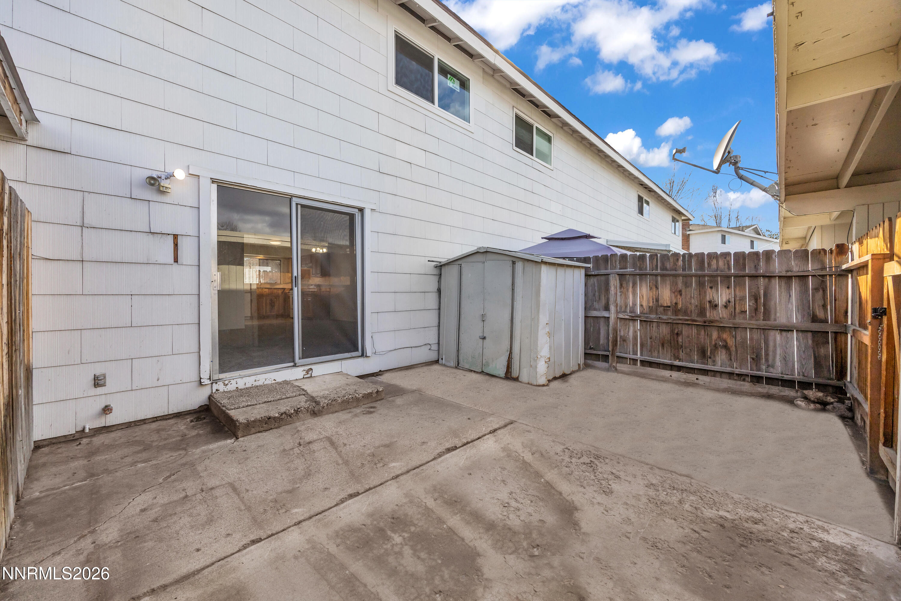 577 Smithridge Park Reno, NV 89502 - Photo 29 of 31 a view of a house with wooden fence