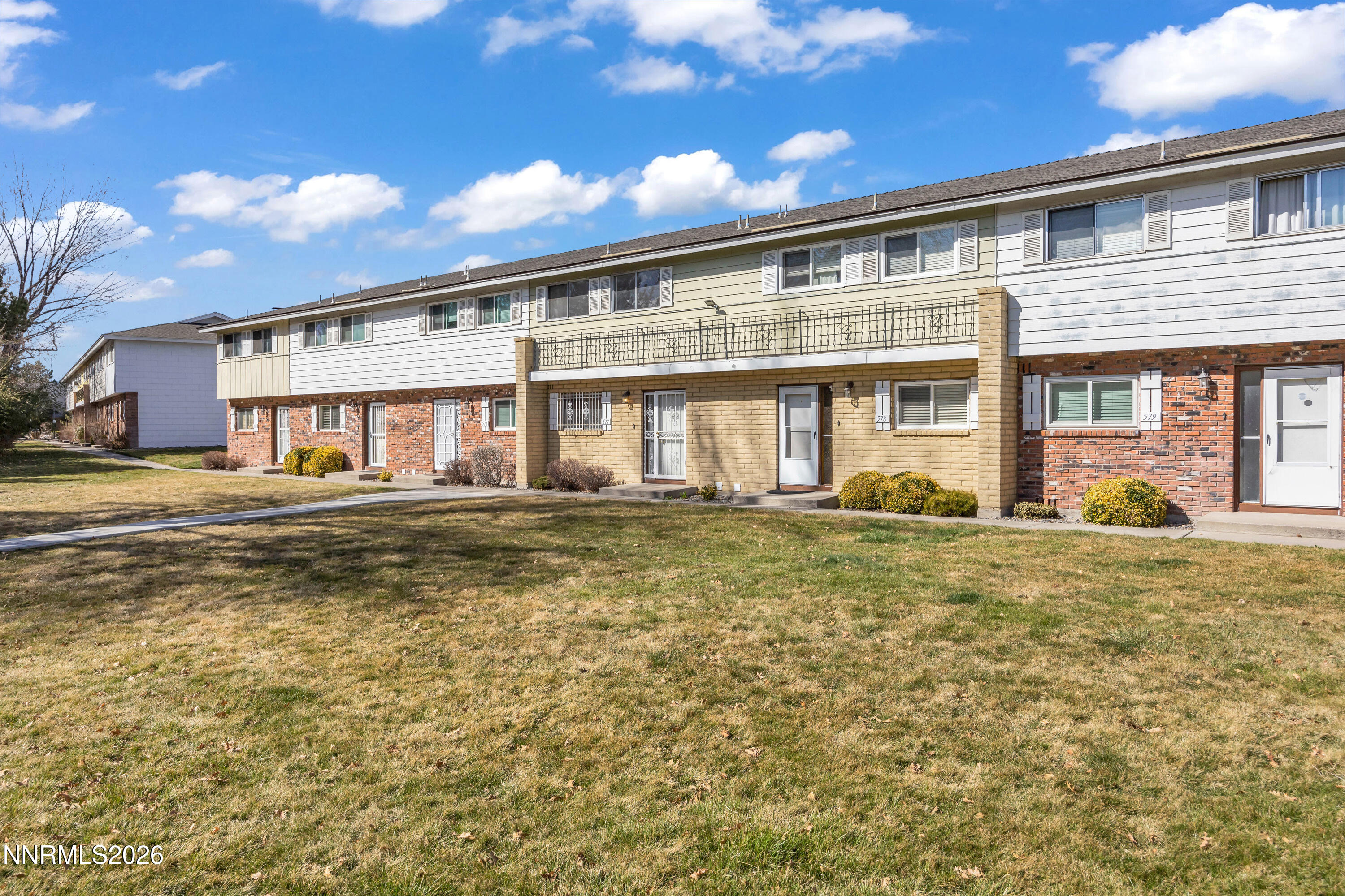577 Smithridge Park Reno, NV 89502 - Photo 6 of 31 a front view of a house with a garden