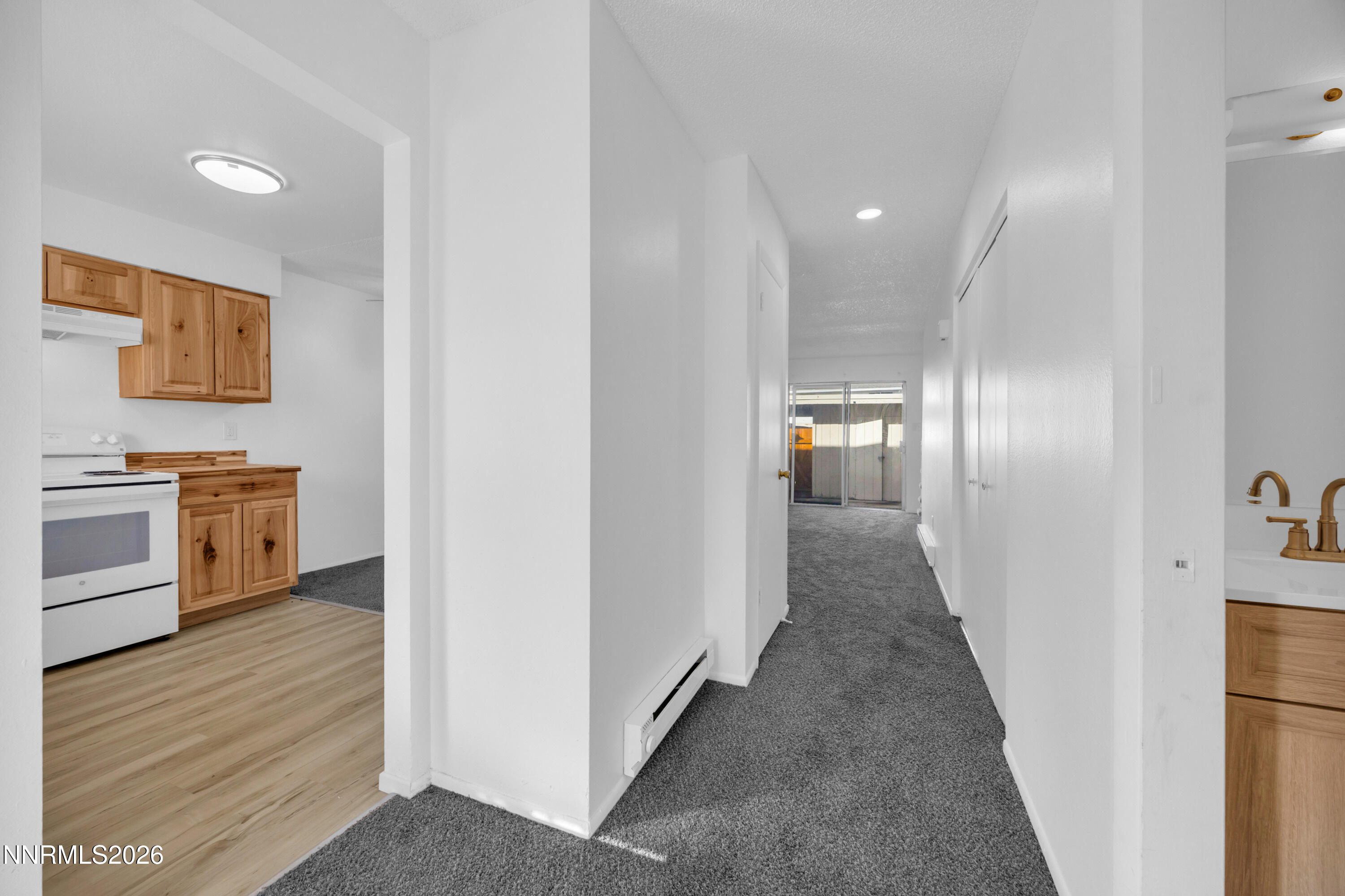 577 Smithridge Park Reno, NV 89502 - Photo 10 of 31 a view of a hallway with the wooden shelves
