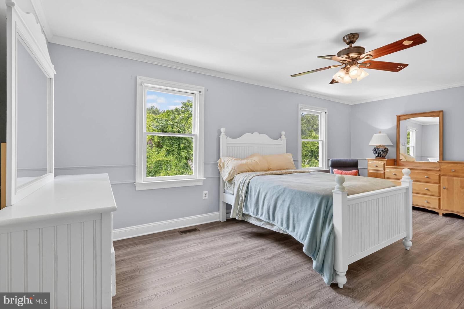 2108 Merrifields Drive Silver Spring, MD 20906 - Photo 33 of 69 a bedroom with a large bed and a window