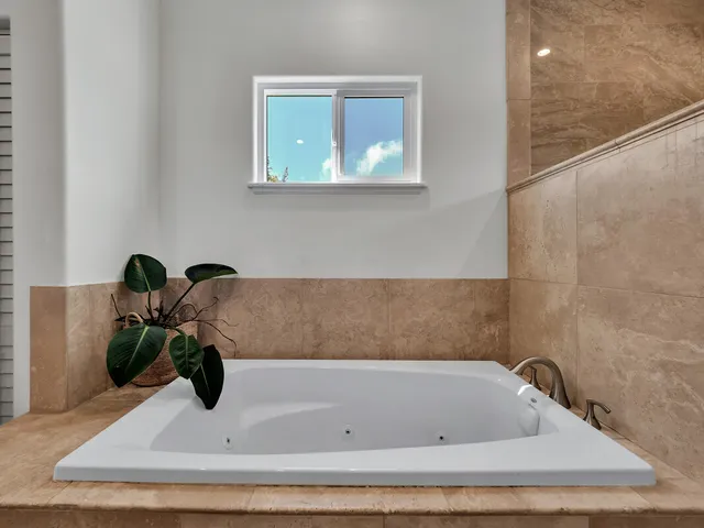 a bathroom with a bathtub