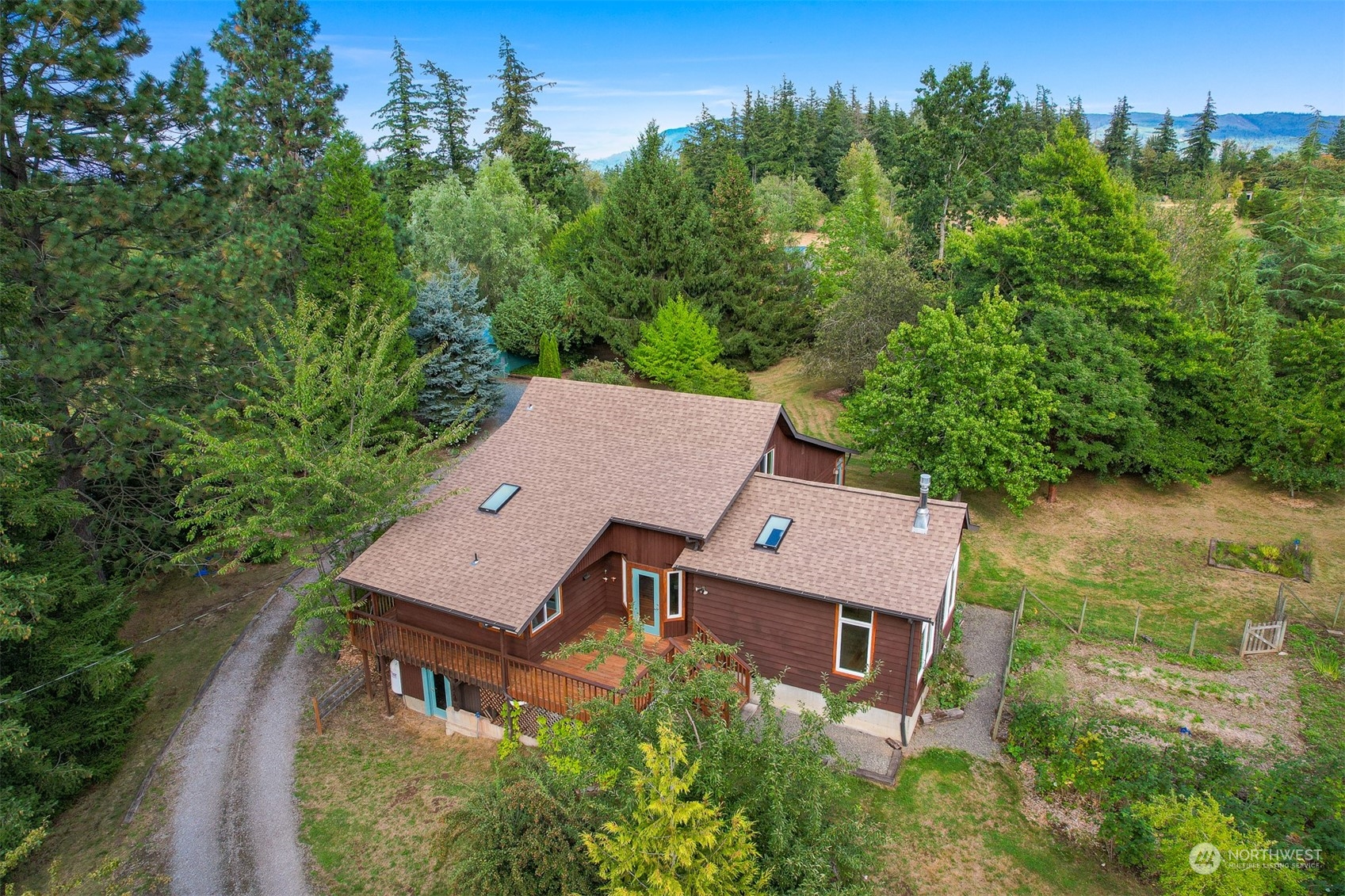 6366 Mission Road Everson, WA 98247 - Photo 4 of 40 an aerial view of a house with a yard and tree s