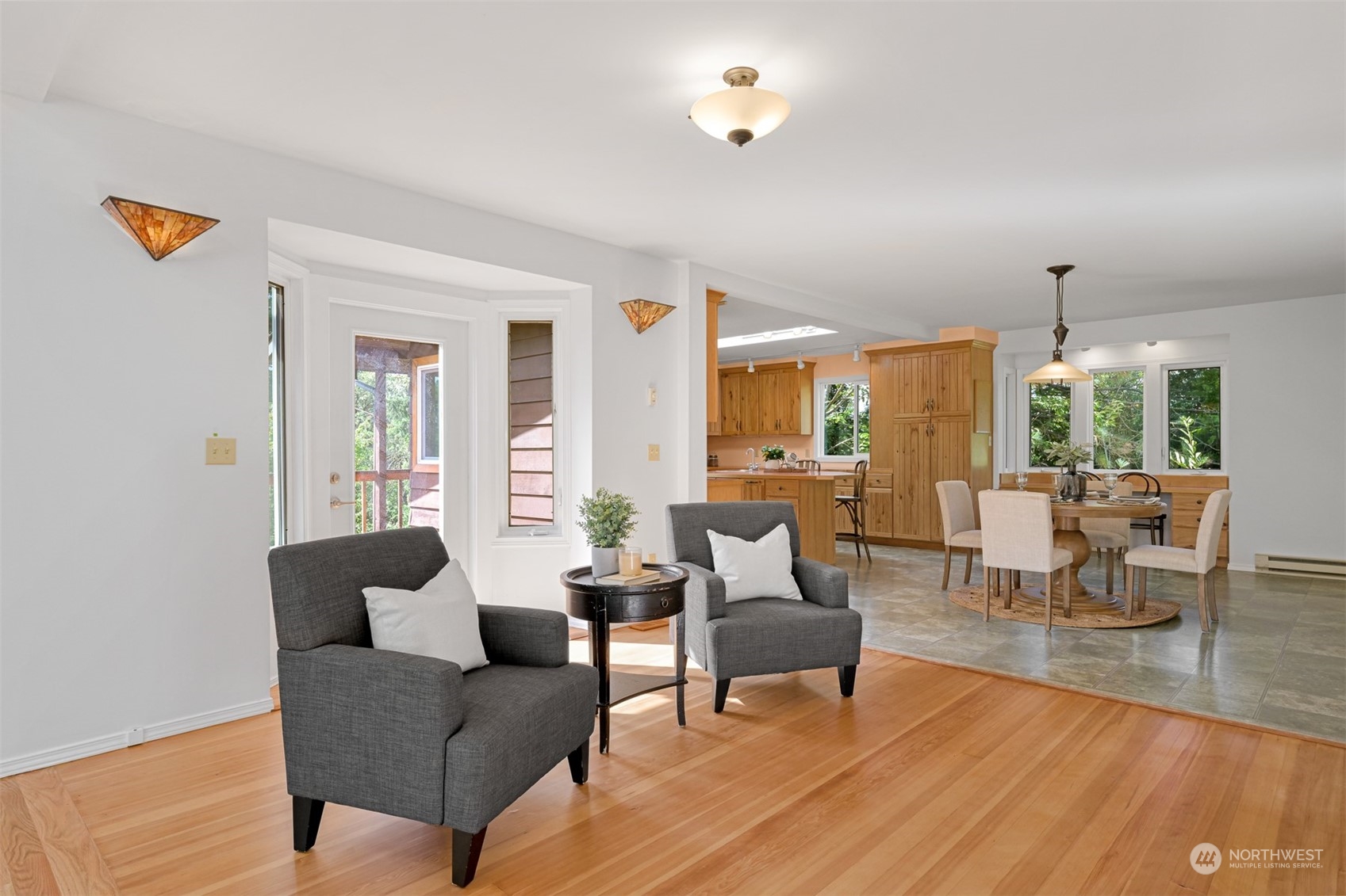 6366 Mission Road Everson, WA 98247 - Photo 10 of 40 a living room with furniture and a wooden floor