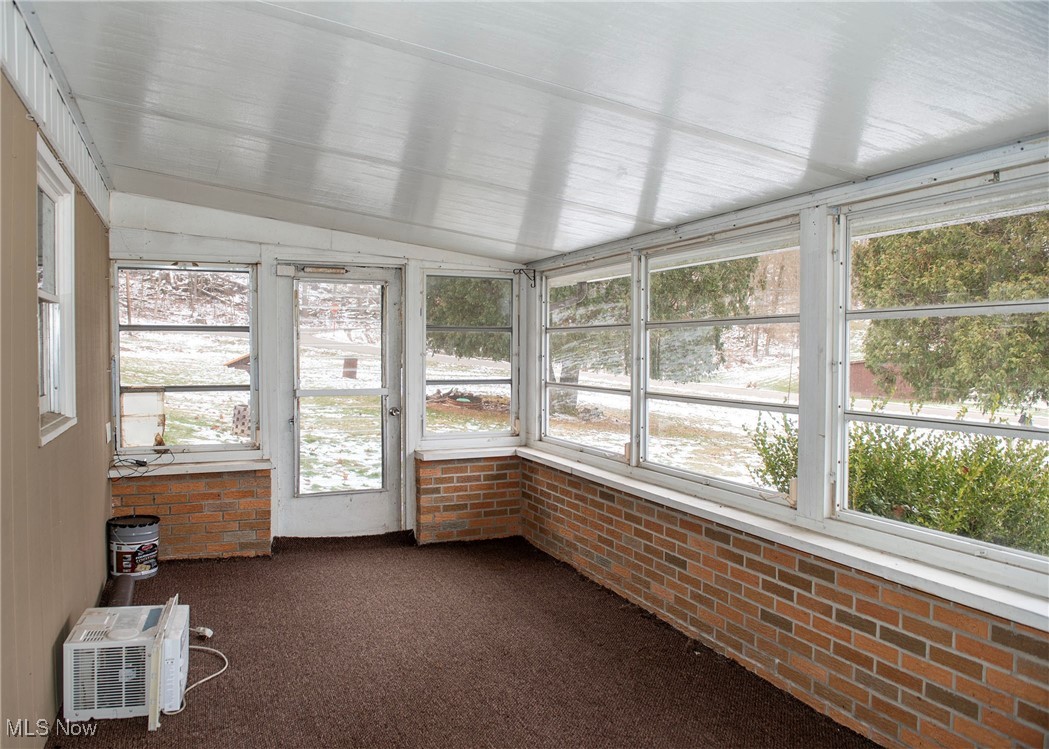 1549 Ridge Road Northeast New Philadelphia, OH 44663 - Photo 14 of 46 Sun room view