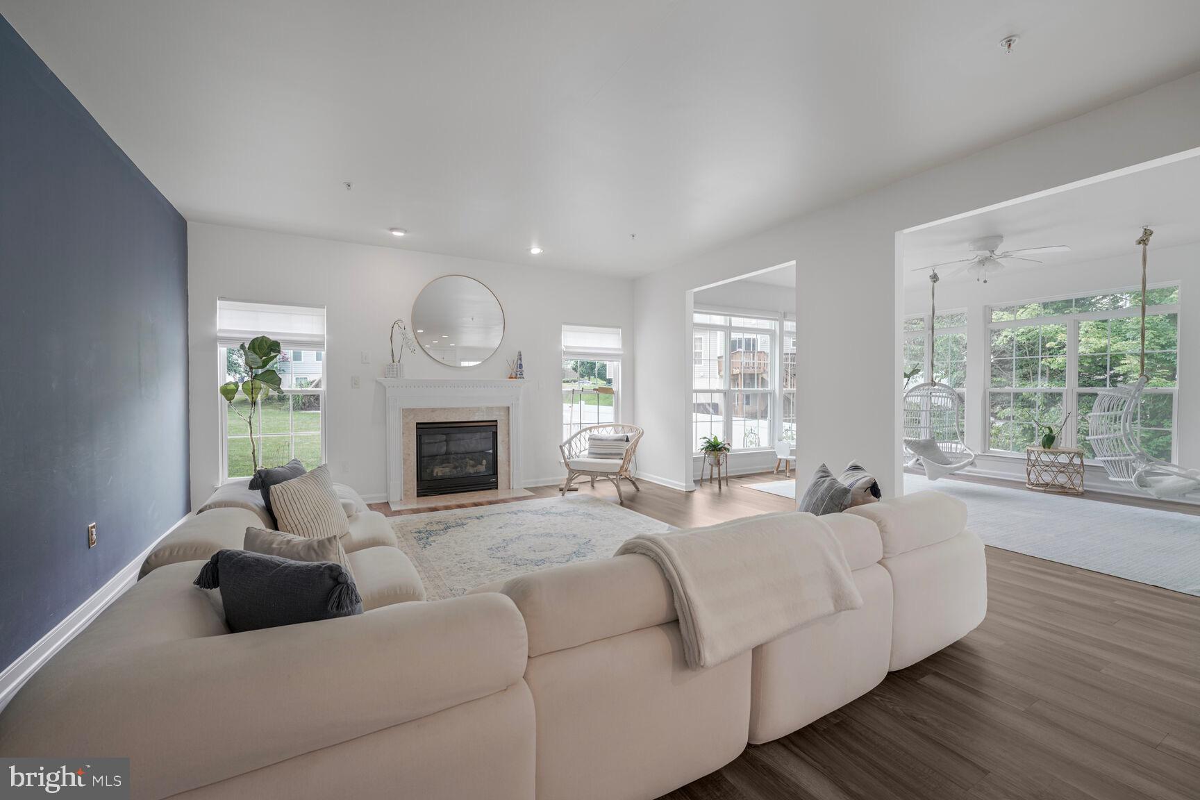 2604 Tree View Way Fort Washington, MD 20744 - Photo 18 of 50 a living room with furniture fireplace and window