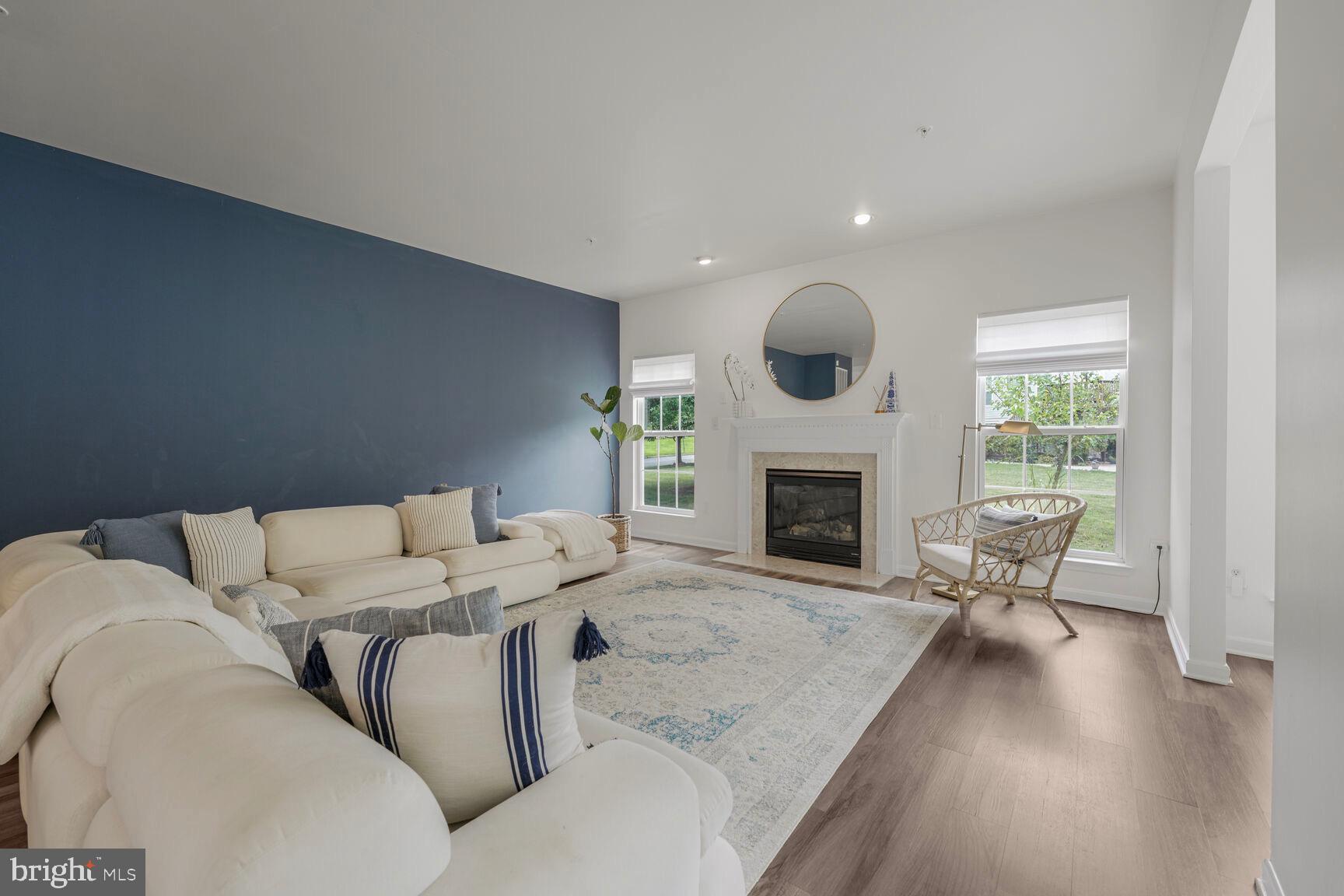 2604 Tree View Way Fort Washington, MD 20744 - Photo 19 of 50 a living room with furniture and a fireplace