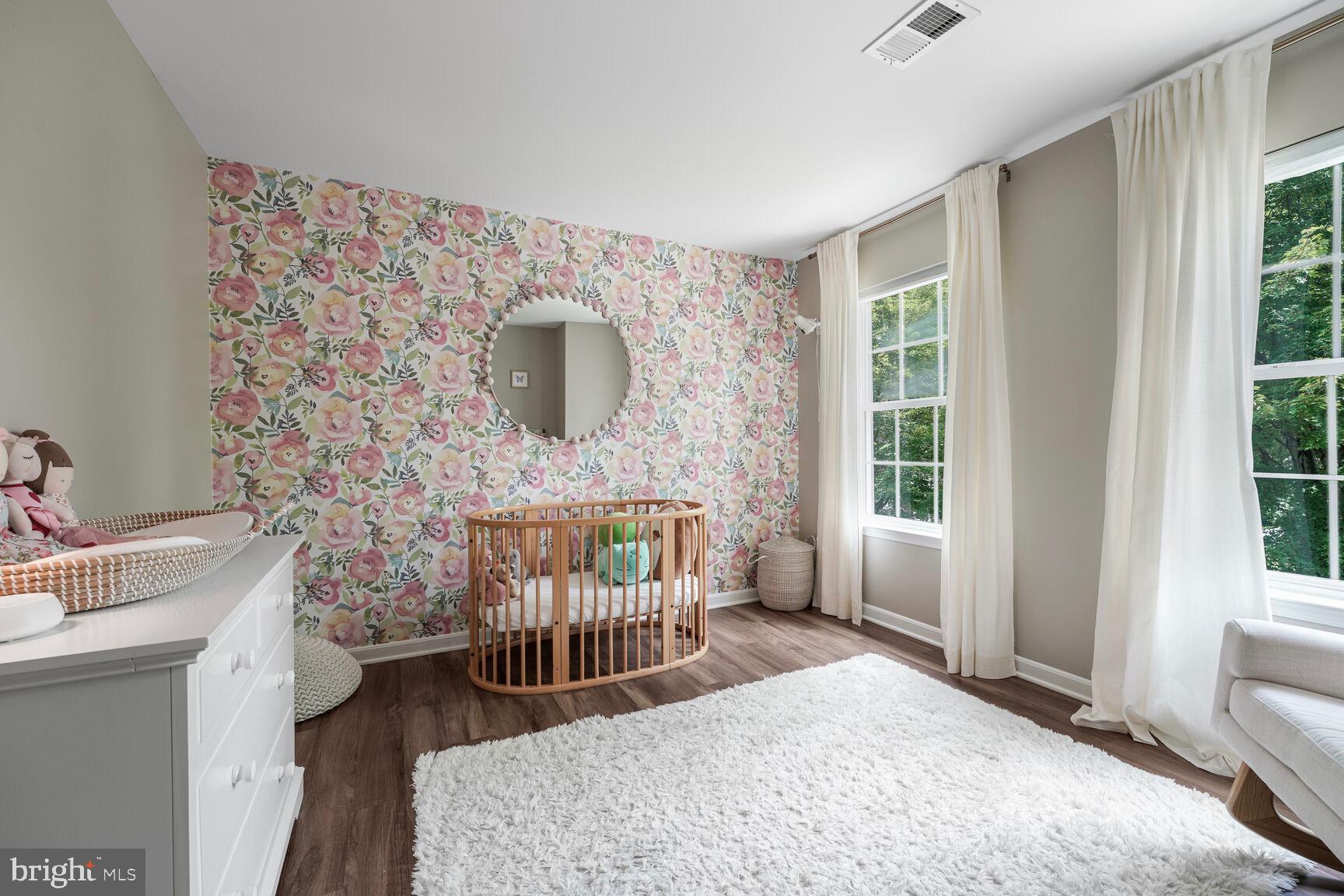 2604 Tree View Way Fort Washington, MD 20744 - Photo 28 of 50 a bedroom with a bed and a window