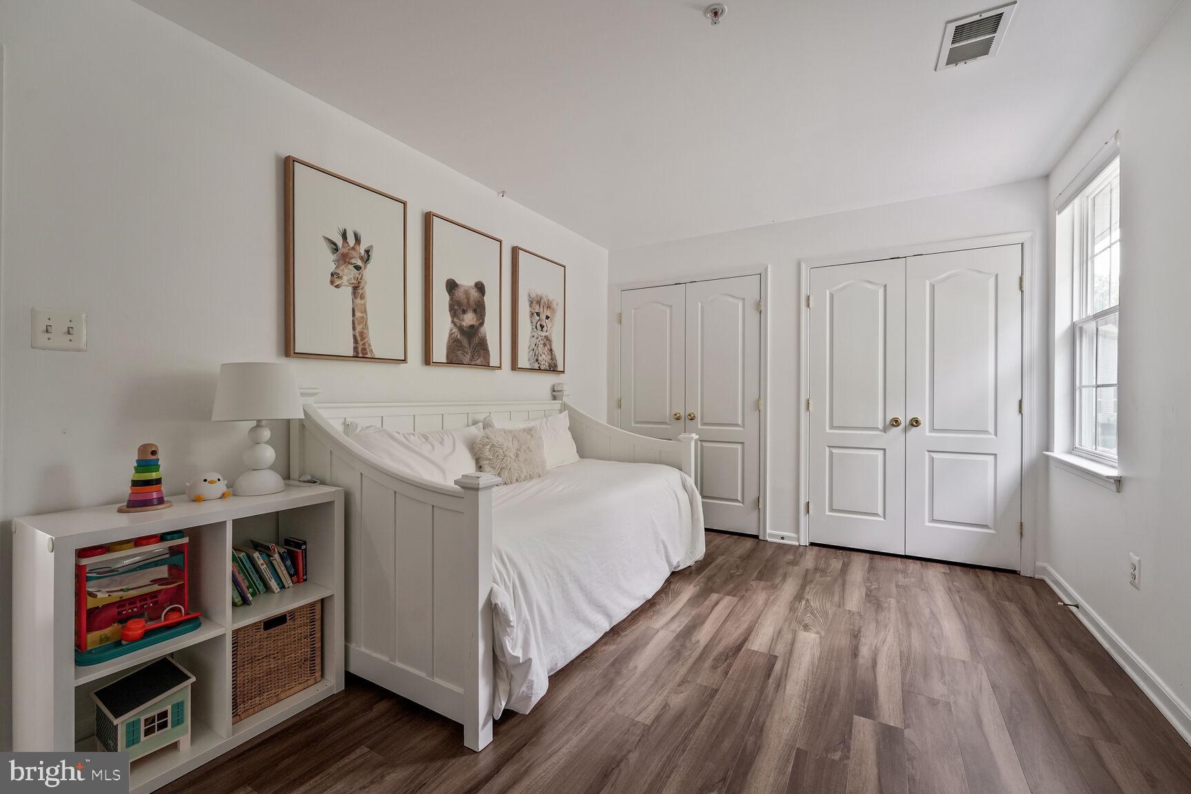 2604 Tree View Way Fort Washington, MD 20744 - Photo 30 of 50 a spacious bedroom with a bed and a window