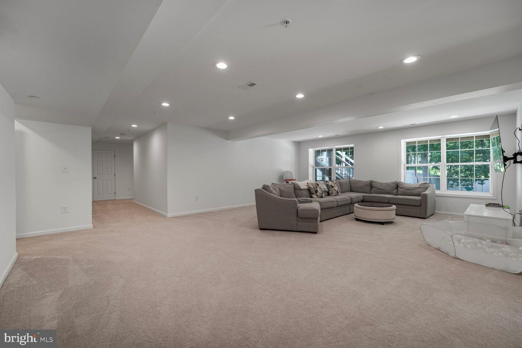 2604 Tree View Way Fort Washington, MD 20744 - Photo 35 of 50 a living room with furniture and a large window