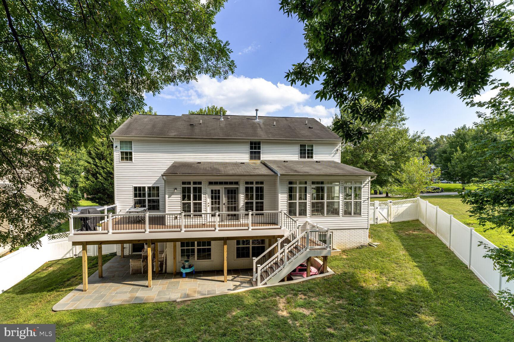 2604 Tree View Way Fort Washington, MD 20744 - Photo 44 of 50 a view of a house with a yard and sitting area