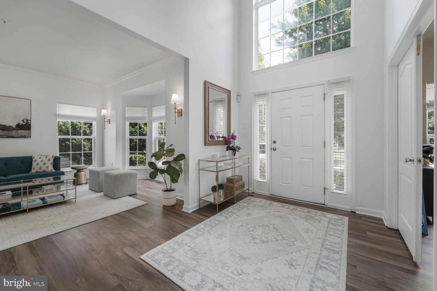 2604 Tree View Way Fort Washington, MD 20744 - Photo 5 of 50 a view of a livingroom with furniture and a window