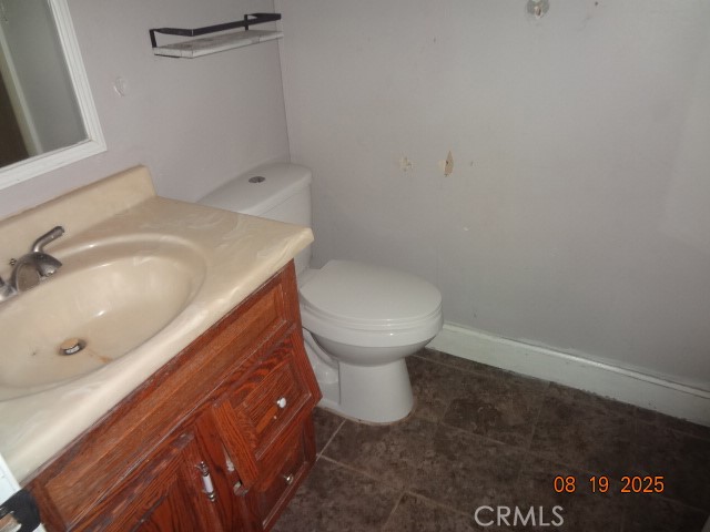 17312 Cache Creek Road Clearlake Oaks, CA 95423 - Photo 13 of 20 a bathroom with a sink and a toilet