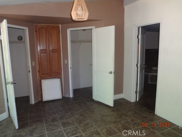 17312 Cache Creek Road Clearlake Oaks, CA 95423 - Photo 17 of 20 an empty room with wooden floor