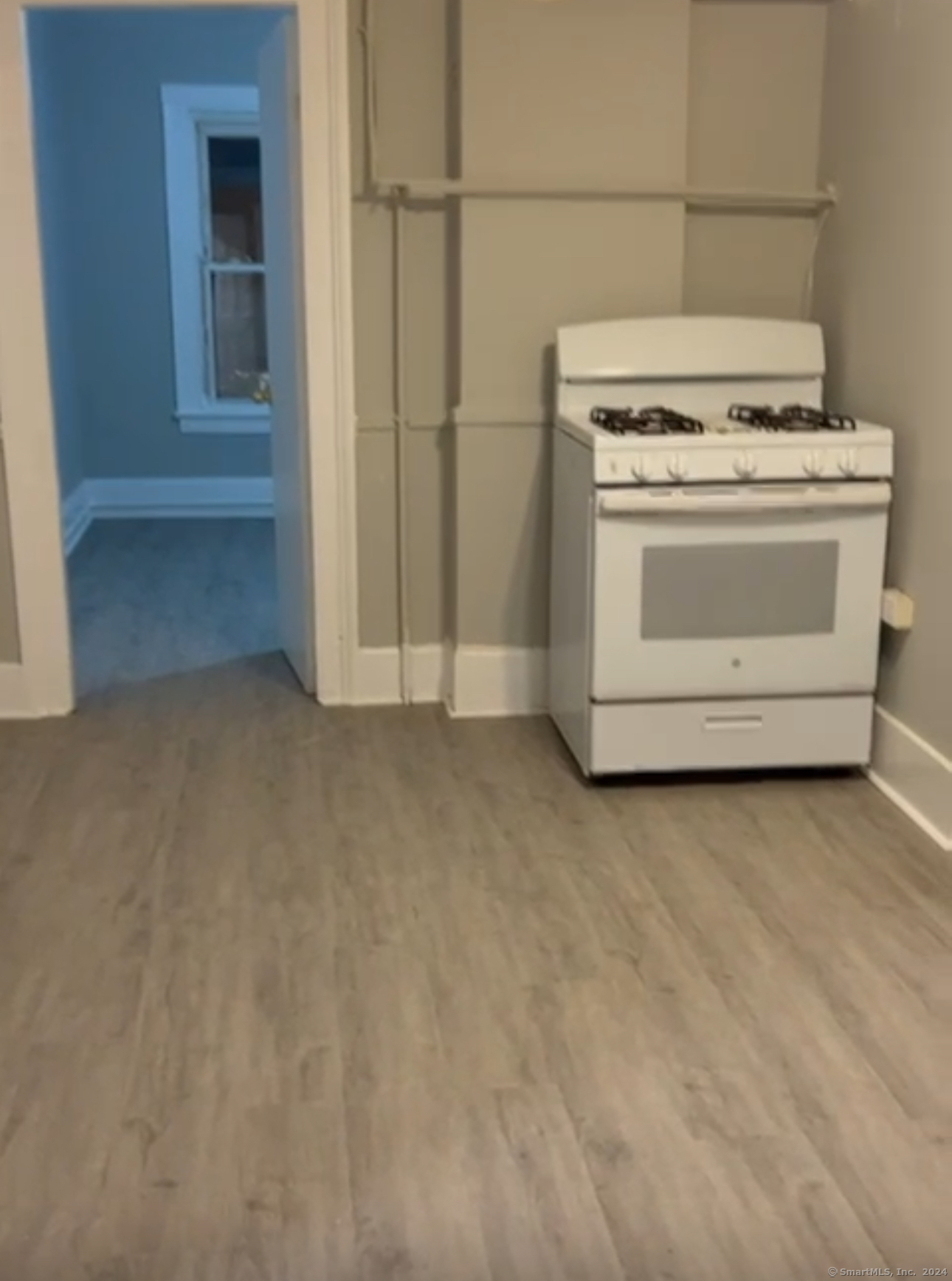 463 Lafayette Street, Unit 3 Bridgeport, CT 06604 - Photo 1 of 1 a view of stove top oven and cabinets