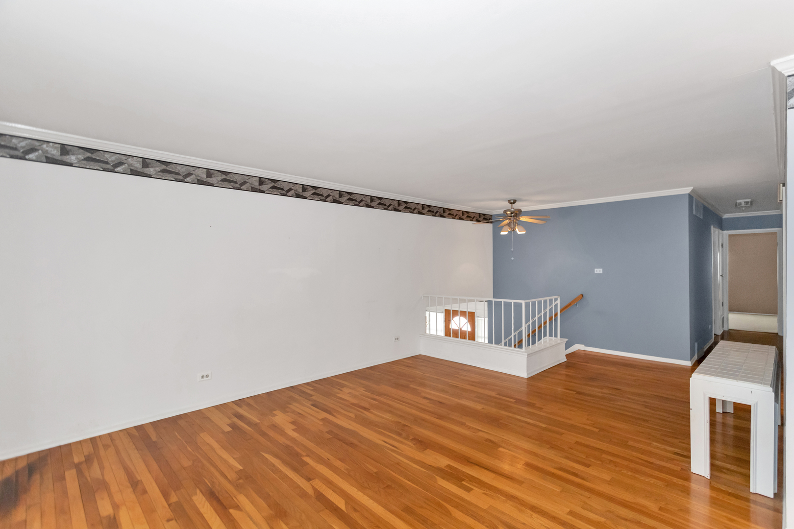 1900 Chippendale Road Hoffman Estates, IL 60169 - Photo 12 of 37 a view of a room with wooden floor