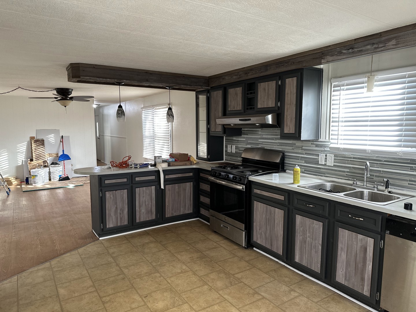 31 Meadowlark Lane Beecher, IL 60401 - Photo 3 of 23 a kitchen with stainless steel appliances granite countertop a stove a sink and a microwave
