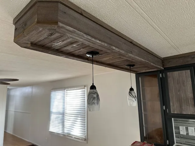 a bathroom with a shower and a mirror