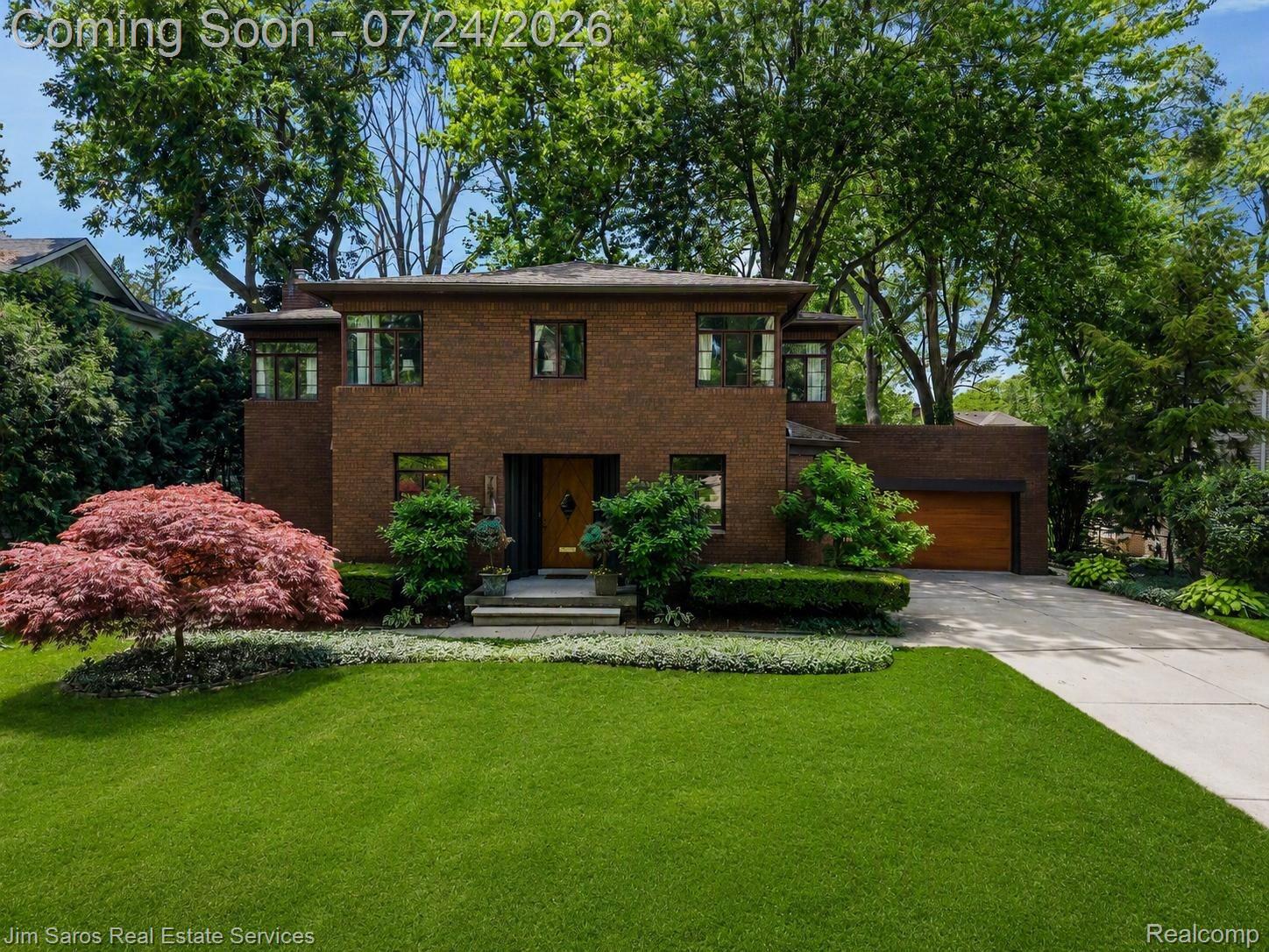 757 Middlesex Road Grosse Pointe, MI 48230 - Photo 1 of 45 Brick facade residence with a prominent front lawn and mature trees