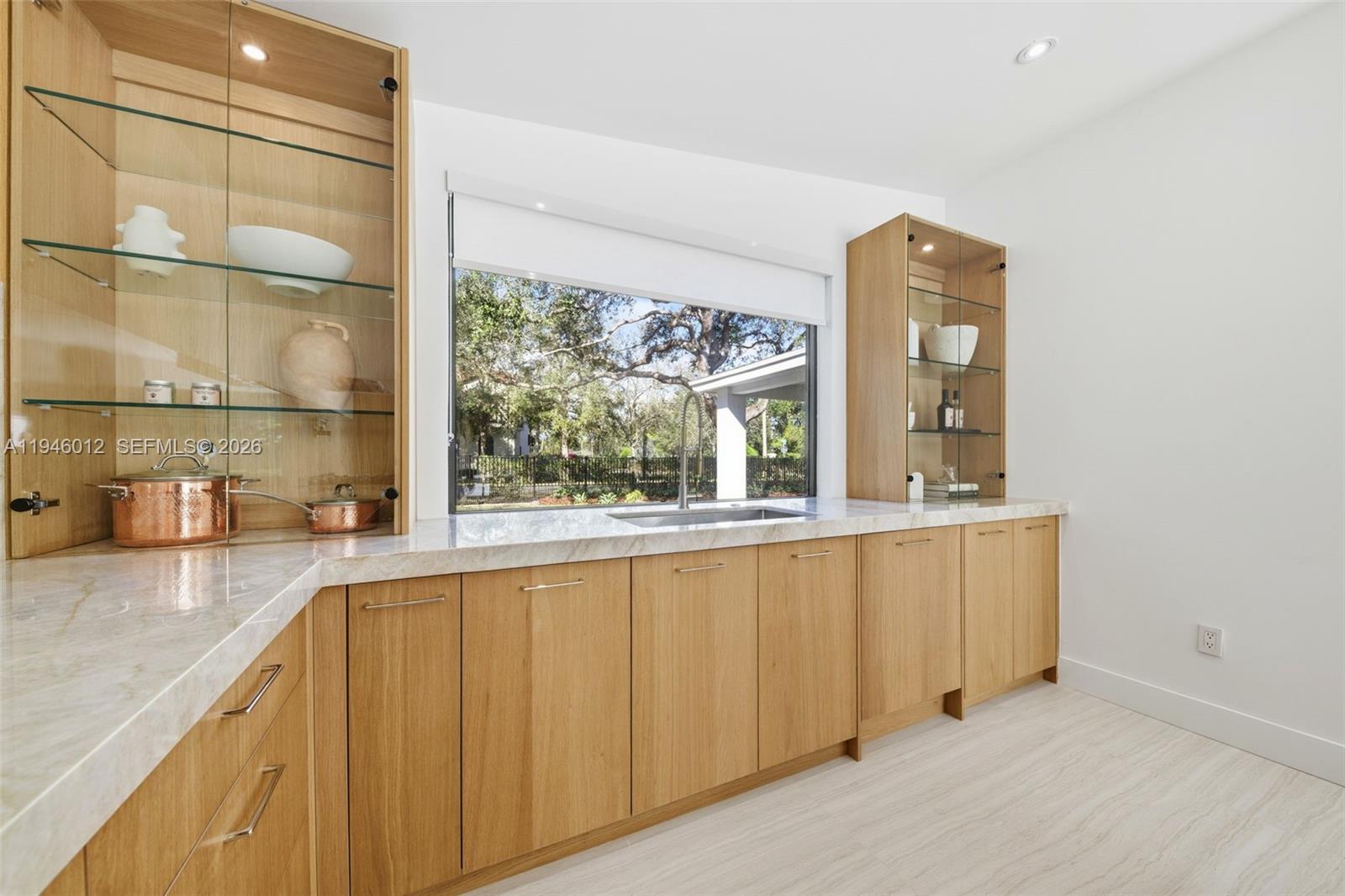 8800 Southwest 118th Street Miami, FL 33176 - Photo 19 of 44 a view of a kitchen with a sink and a large window