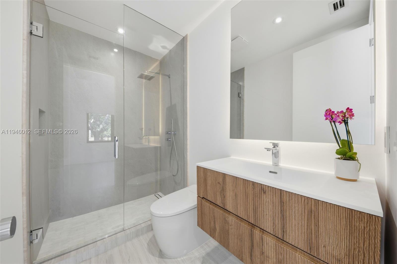 8800 Southwest 118th Street Miami, FL 33176 - Photo 40 of 44 a bathroom with a sink and a mirror