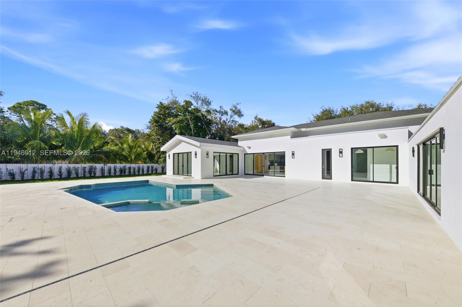 8800 Southwest 118th Street Miami, FL 33176 - Photo 43 of 44 a front view of a house with a garden