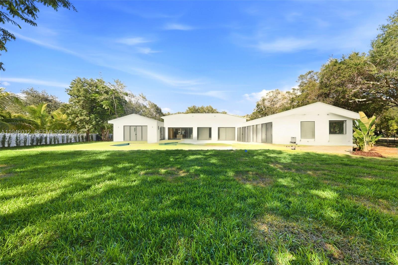 8800 Southwest 118th Street Miami, FL 33176 - Photo 44 of 44 a house view with a garden space