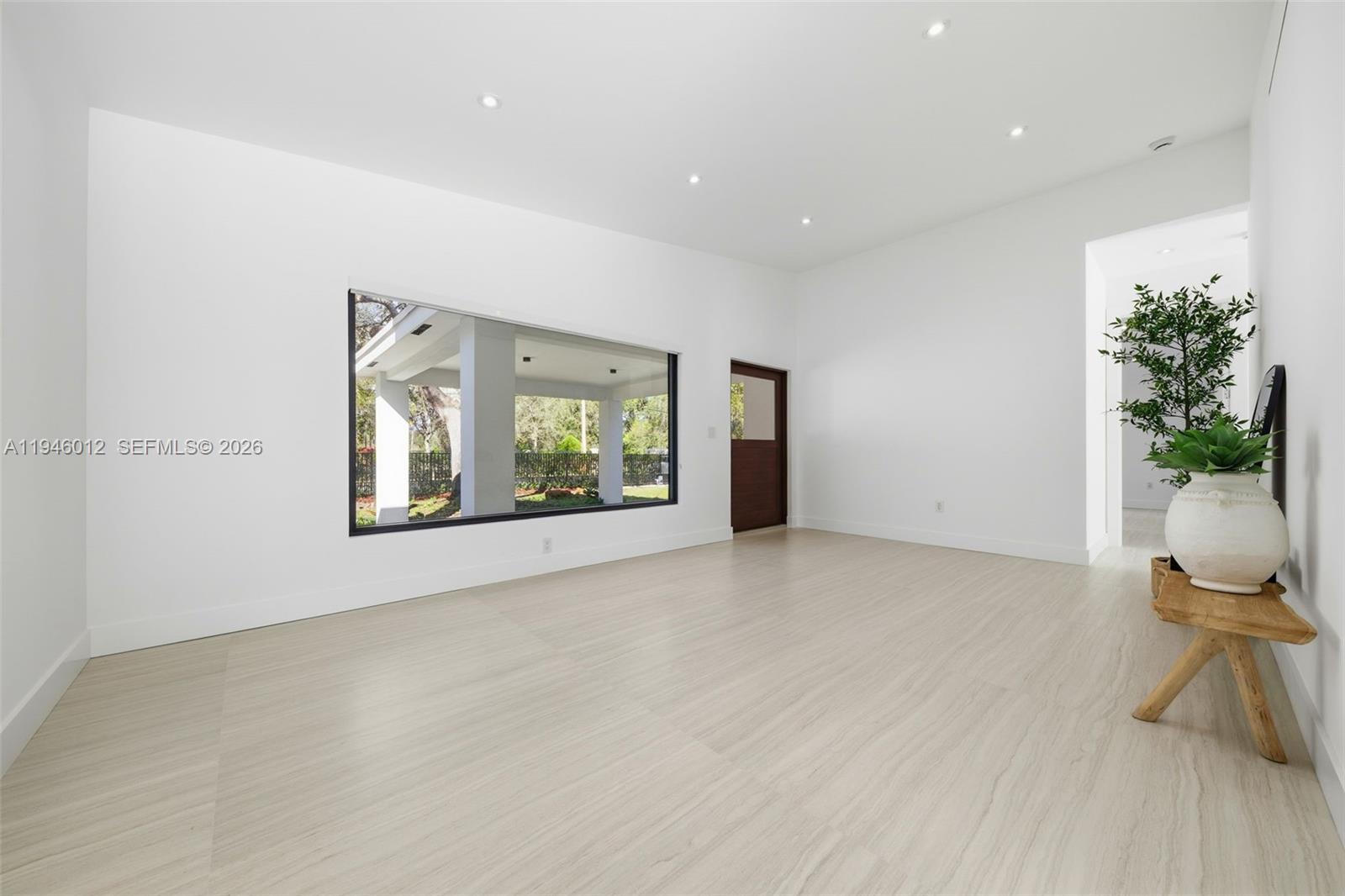 8800 Southwest 118th Street Miami, FL 33176 - Photo 9 of 44 a view of an empty room with a window