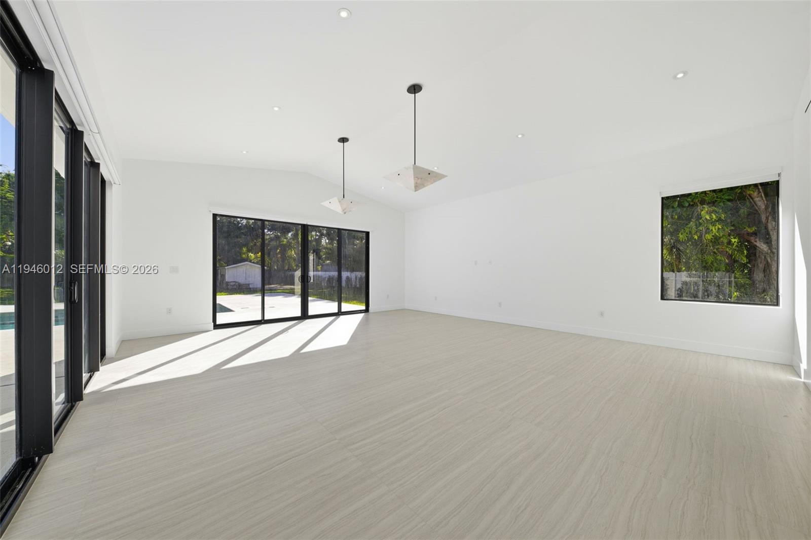 8800 Southwest 118th Street Miami, FL 33176 - Photo 10 of 44 a view of an empty room with a window