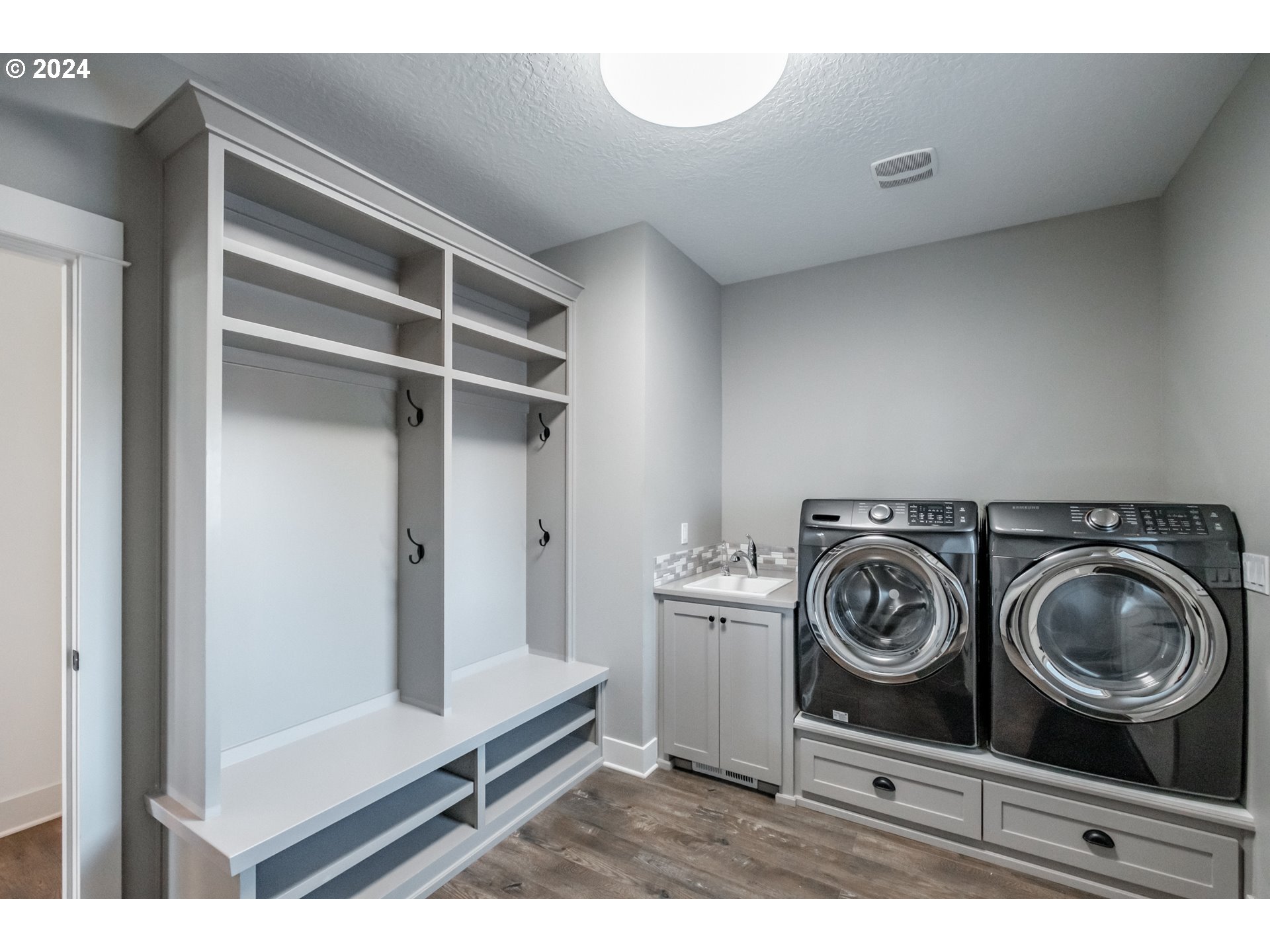 10886 Bethel Road Amity, OR 97101 - Photo 18 of 42 a utility room with sink dryer and washer