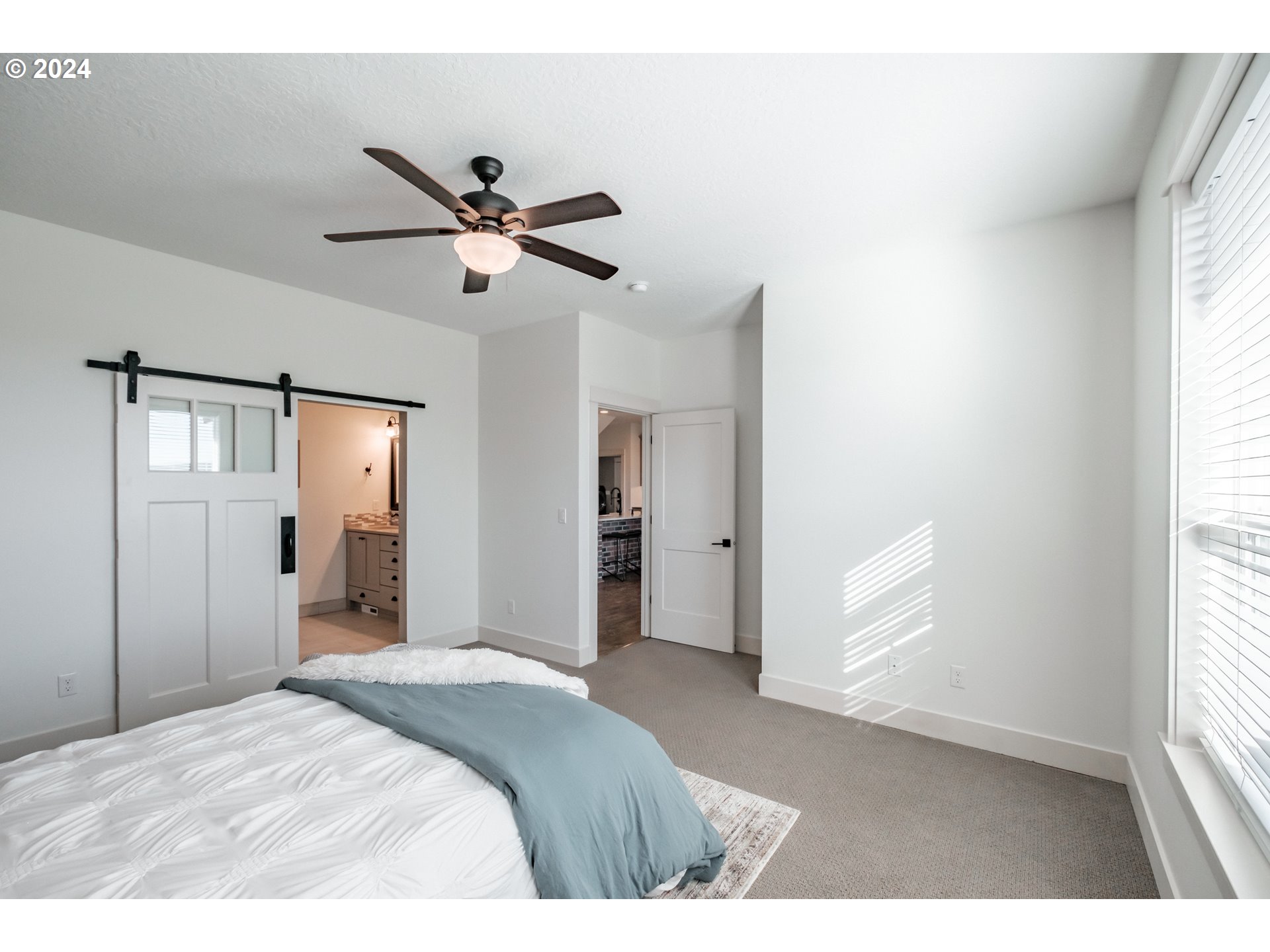 10886 Bethel Road Amity, OR 97101 - Photo 22 of 42 a bedroom with a bed and a window