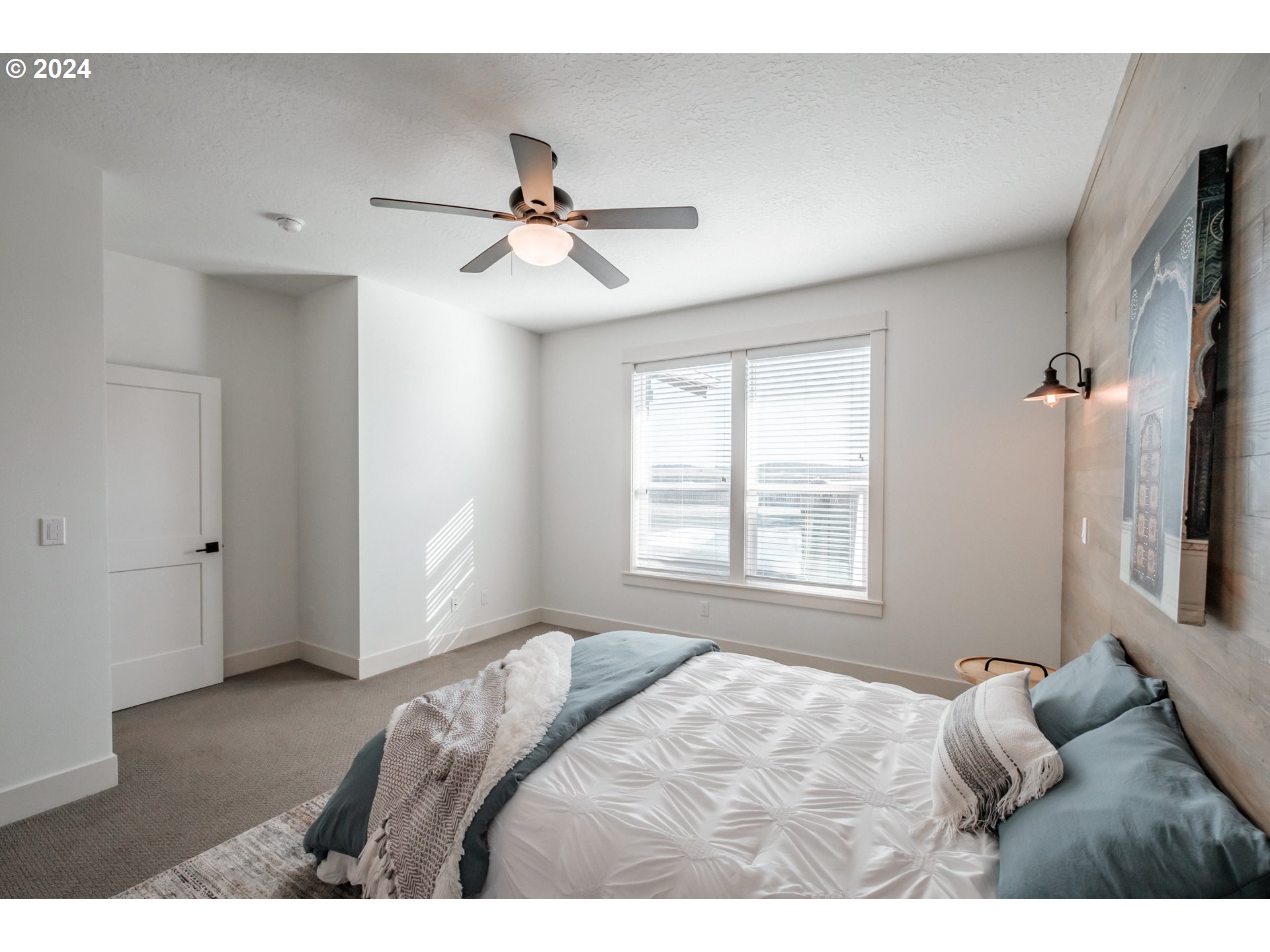 10886 Bethel Road Amity, OR 97101 - Photo 23 of 42 a bedroom with a bed and a window