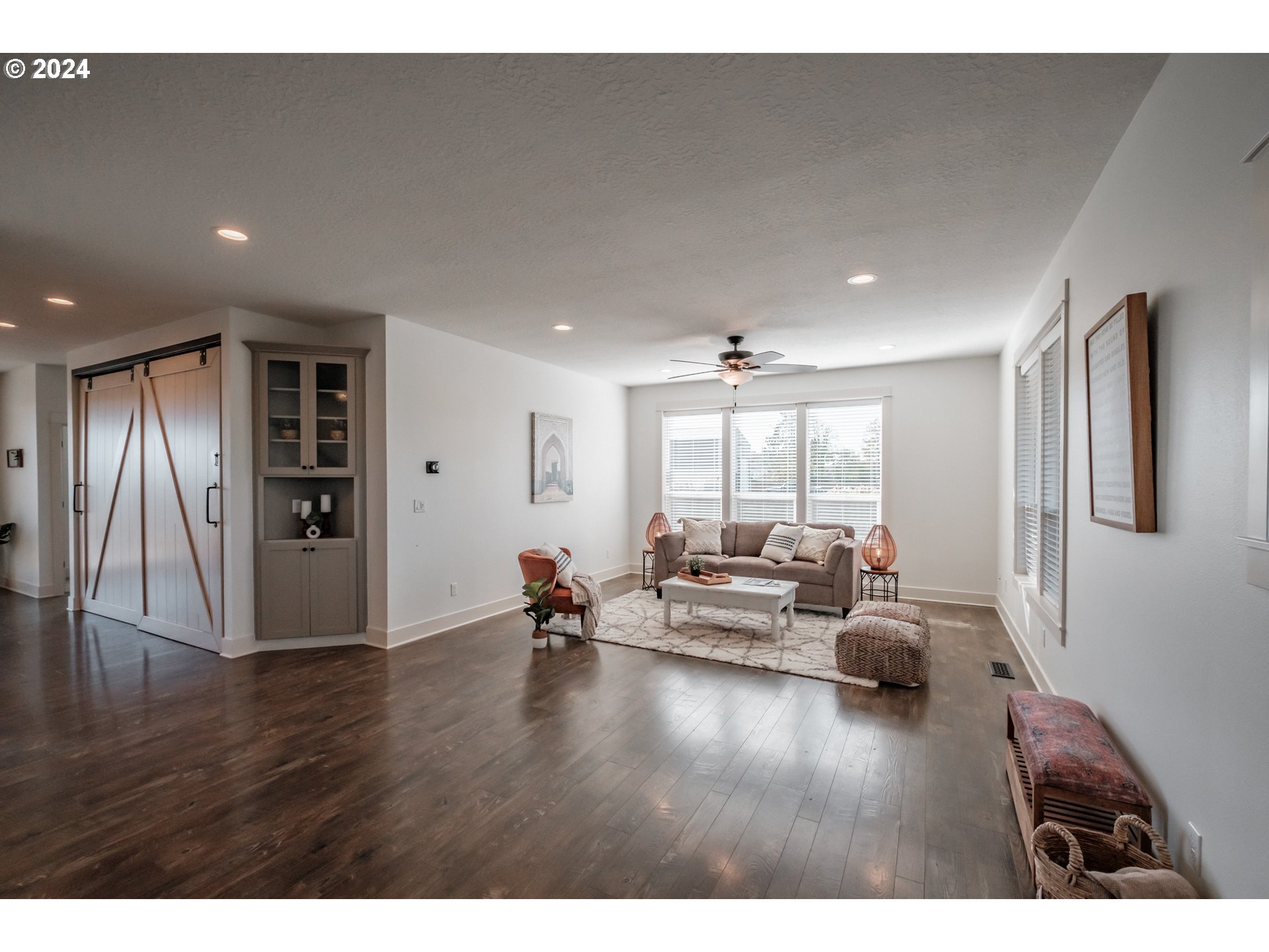 10886 Bethel Road Amity, OR 97101 - Photo 10 of 42 a living room with furniture window and wooden floor