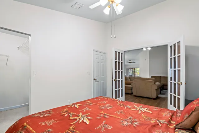 a bedroom with a bed and furniture