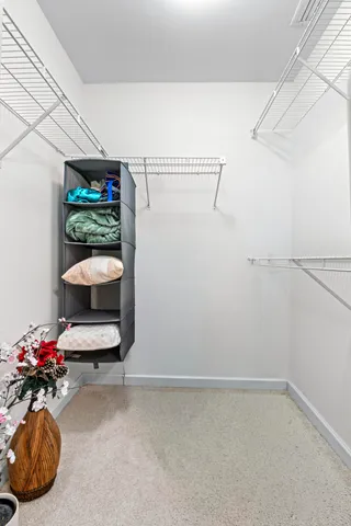 a view of a room with racks on the wall