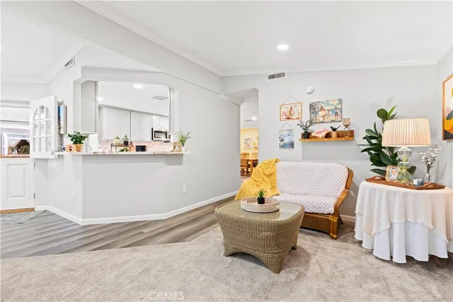 a living room with furniture and a table